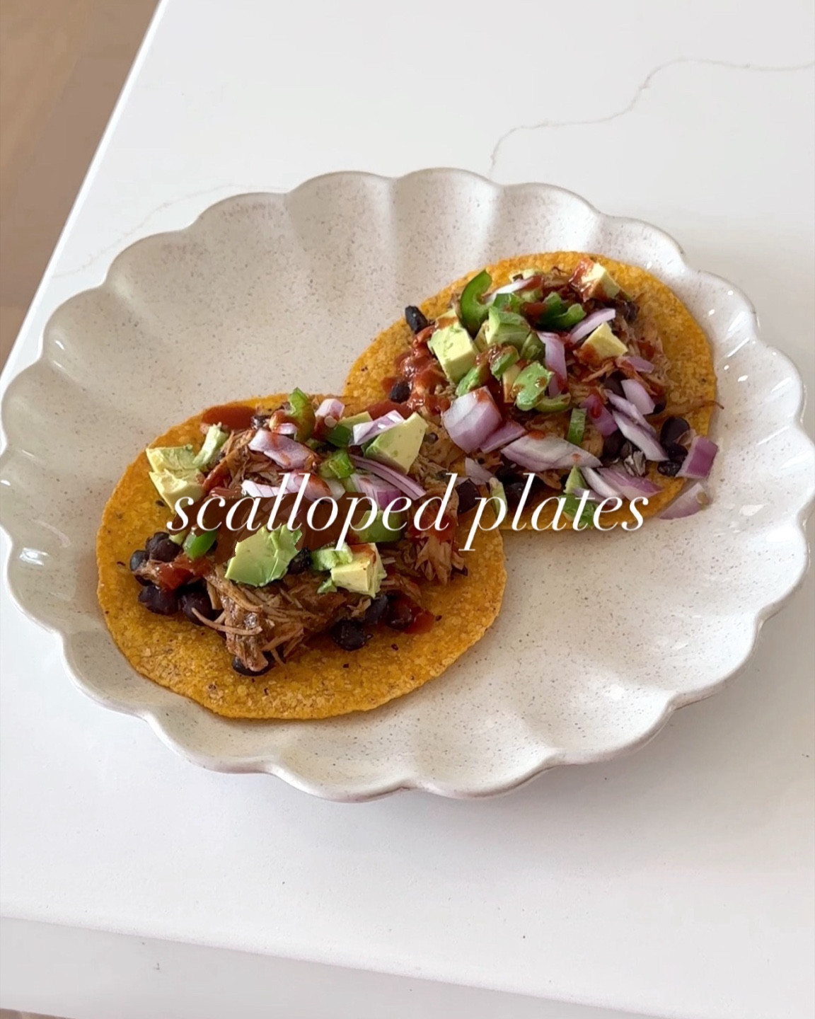 My affordable ceramic scalloped plates from world market are one of my favorite purchases of 2025! I received the balls for Christmas and I was so in love with them. I had to buy the plates from the set! Inexpensive these are all of my meals and look great in my kitchen!! 

Home finds, kitchen finds, dish ware, plates, aesthetic kitchen 

#LTKHome