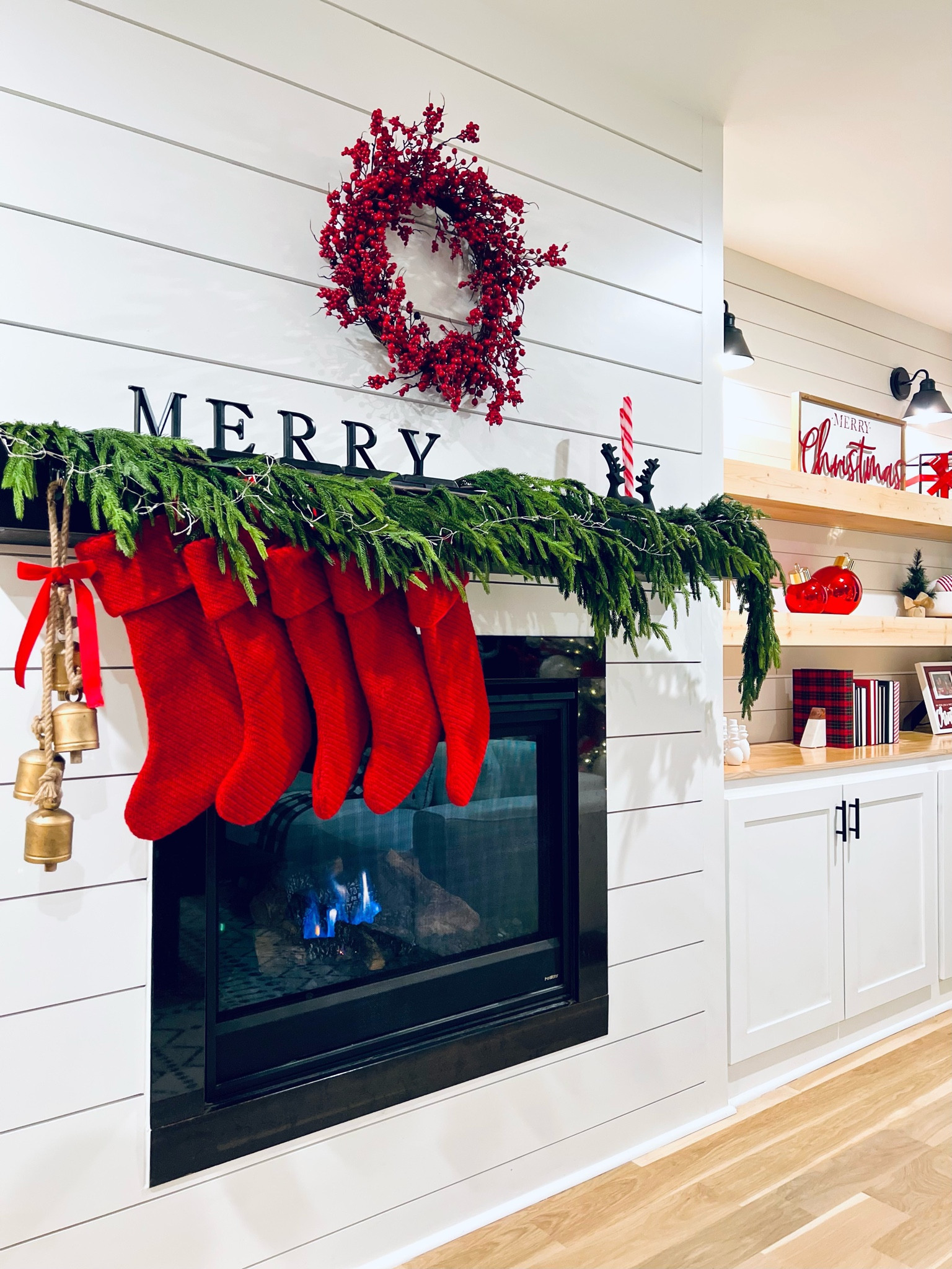 Merry & Bright themed Christmas Mantel. A splash of green complimented by red and white. I absolutely love it. 

#LTKHoliday #LTKhome #LTKfindsunder100
