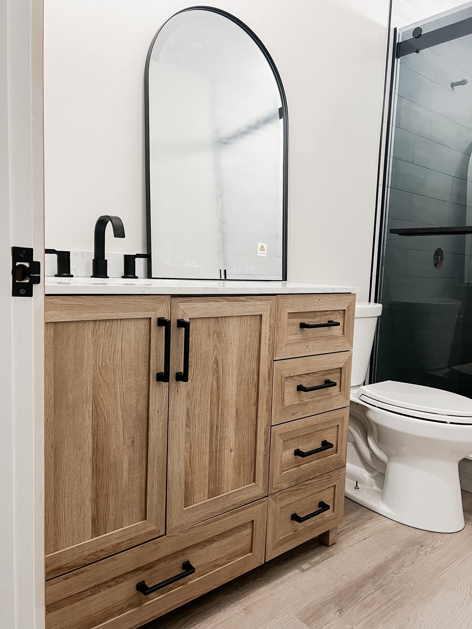 Bathroom remodel is almost complete! Absolutely loving this vanity and mirror!! 

Home remodel, bathroom remodel, bathroom vanity, home decor, bathroom decor 

#LTKFindsUnder100 #LTKHome #LTKOver40