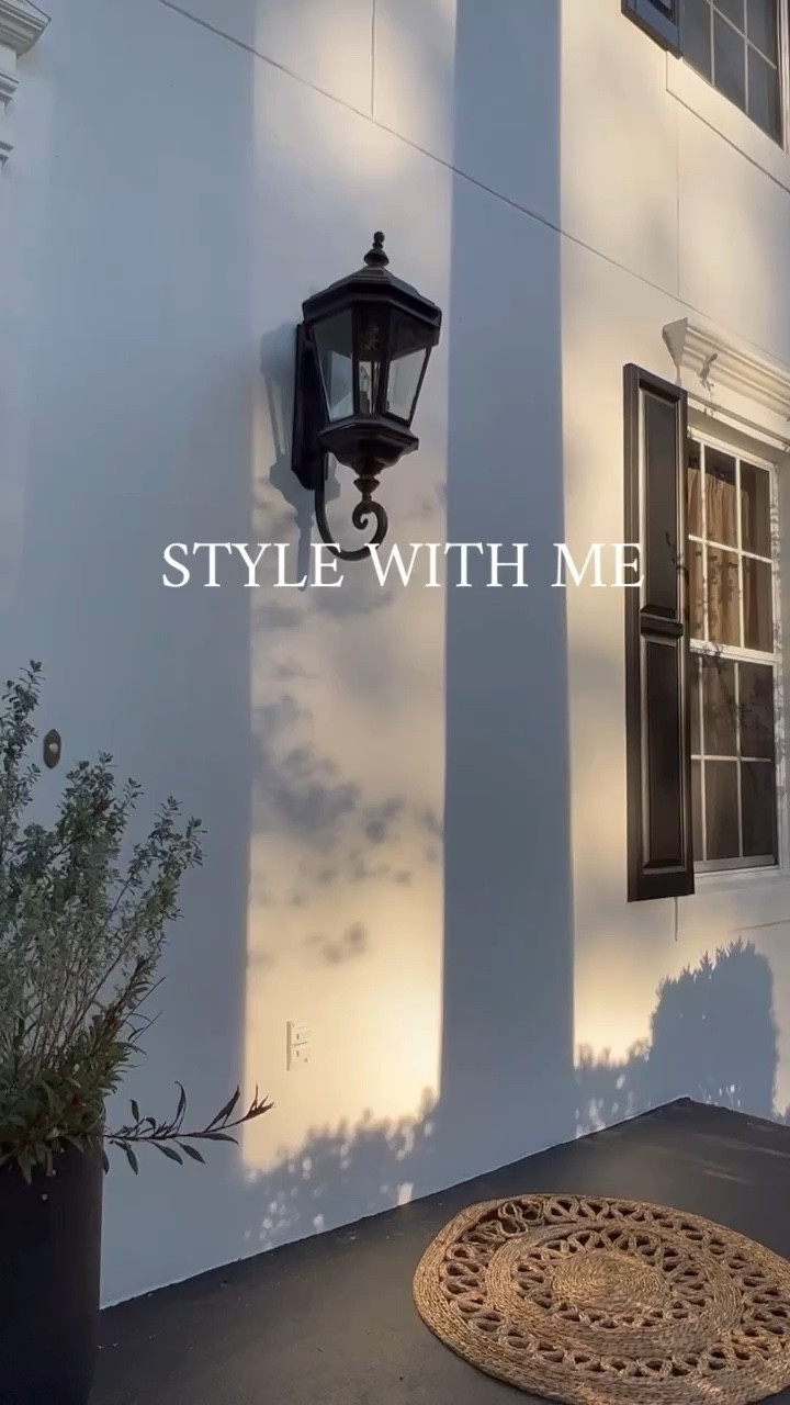 Front porch spring styling! Cozy chairs, plant stand, lanterns, side table and planters. 

#LTKFind #LTKSeasonal #LTKhome