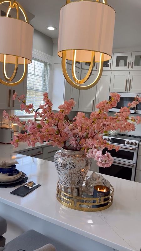 White and gold ginger jar with pink cherry blossom stems! Perfect for spring and summer decorating #gingerjar #vases #springfloral #kitchendecor #homedecor #mothersdsygift #mothersday

#LTKSeasonal #LTKGiftGuide #LTKhome