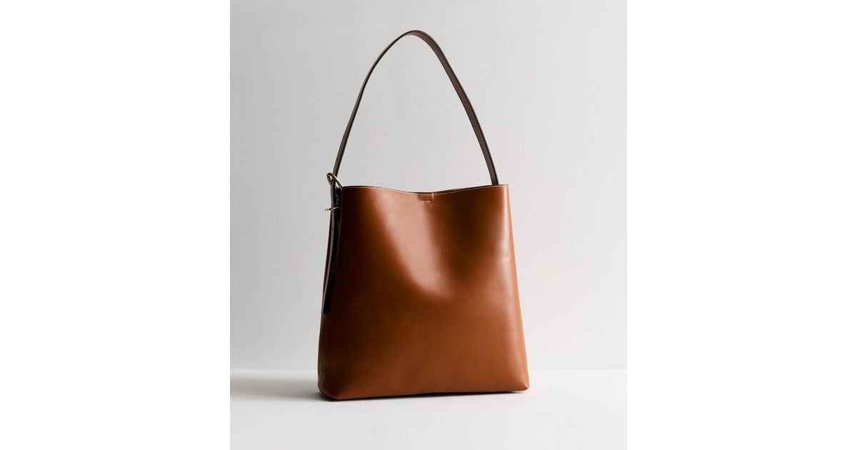 Tan Leather-Look Bucket Bag
						
						Add to Saved Items
						Remove from Saved Items | New Look (UK)