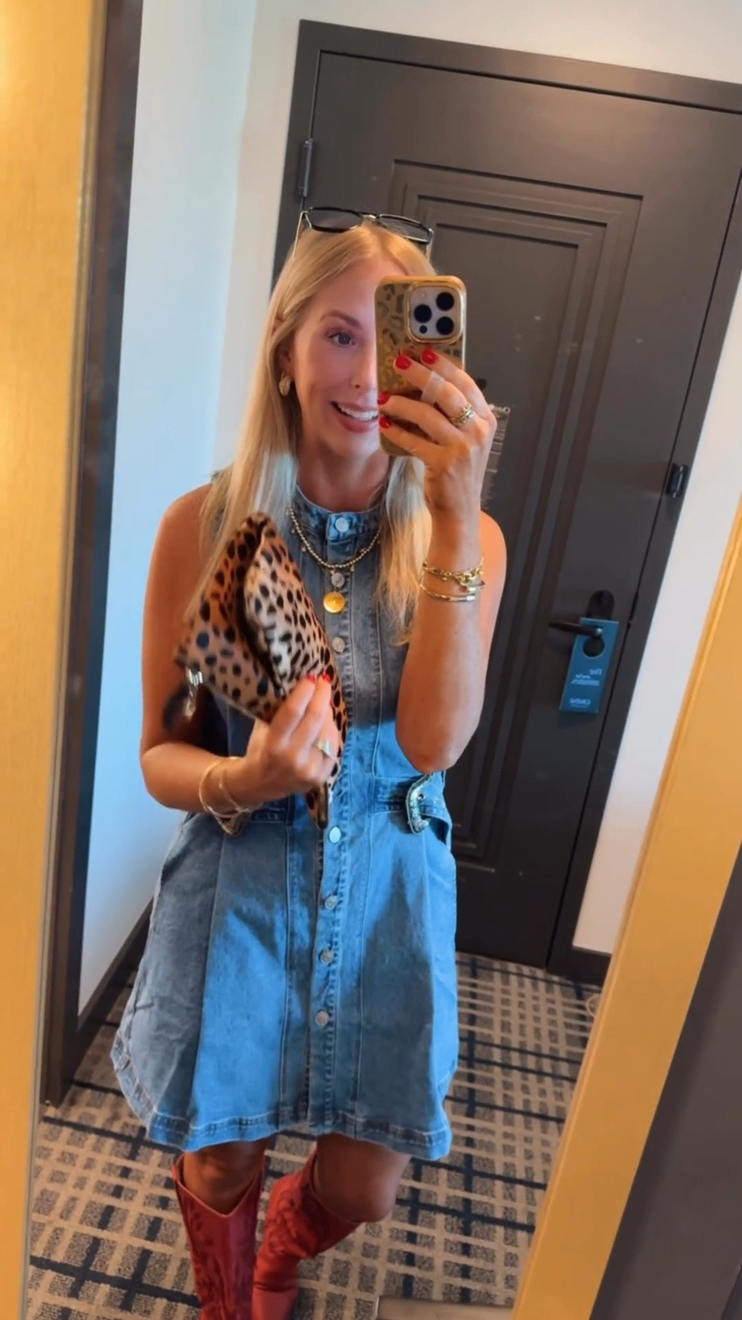LTKCon outfit! Denim party tonight wearing this denim mini dress with side buckles. Paired with red western boots and a pop of leopard 

#LTKFindsUnder100 #LTKCon #LTKShoeCrush