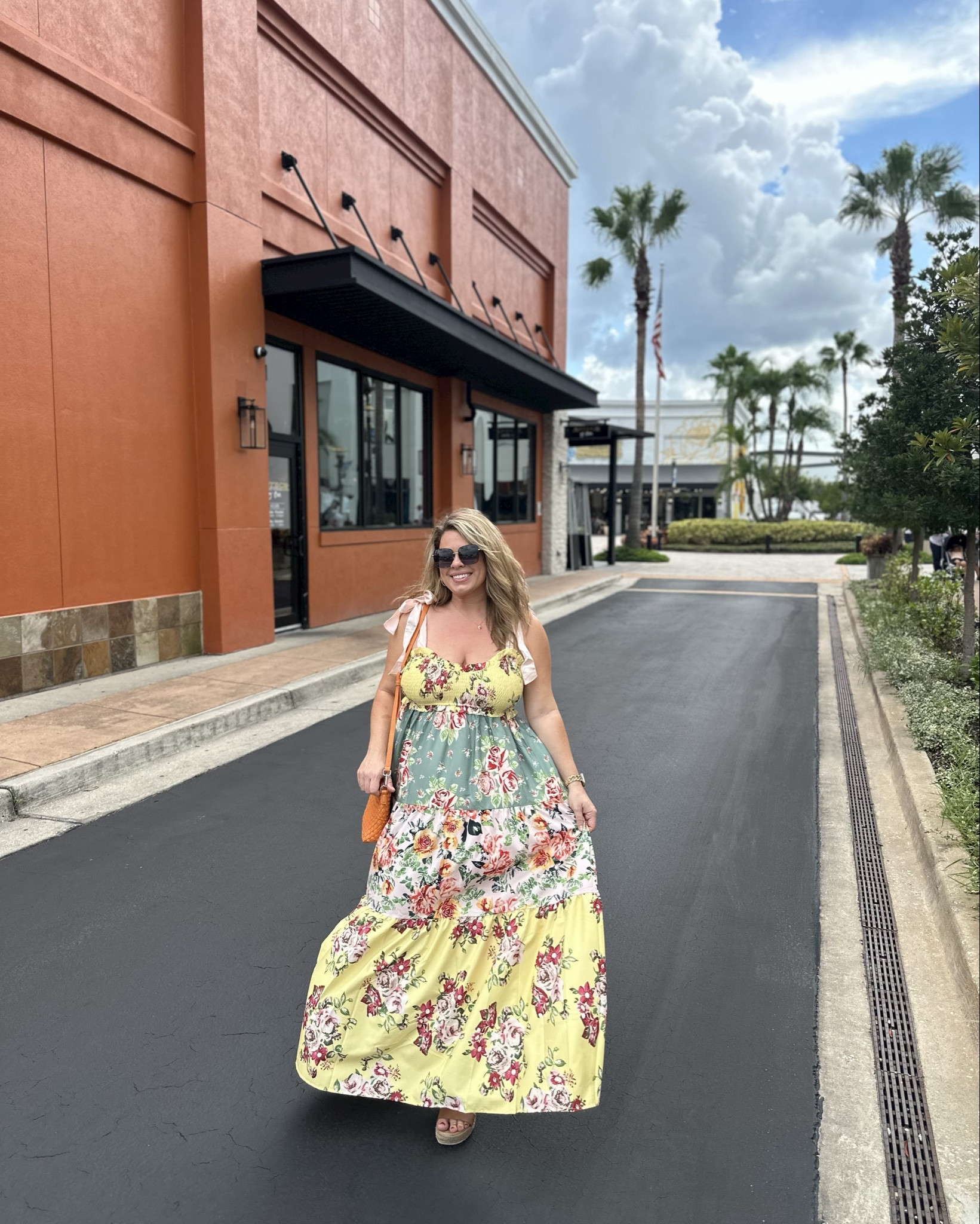 One of my favorite Amazon dress finds. The floral tiered details with the ties at the shoulders.

It comes in so many different colors and instantly makes you feel put together. Add a fun colorful bag and some cute sandals with gold jewelry and the look is complete. You can easily size down in this dress due to the stretchy smocking in the bust and wide skirt area.

#LTKParties #LTKMidsize #LTKFindsUnder50