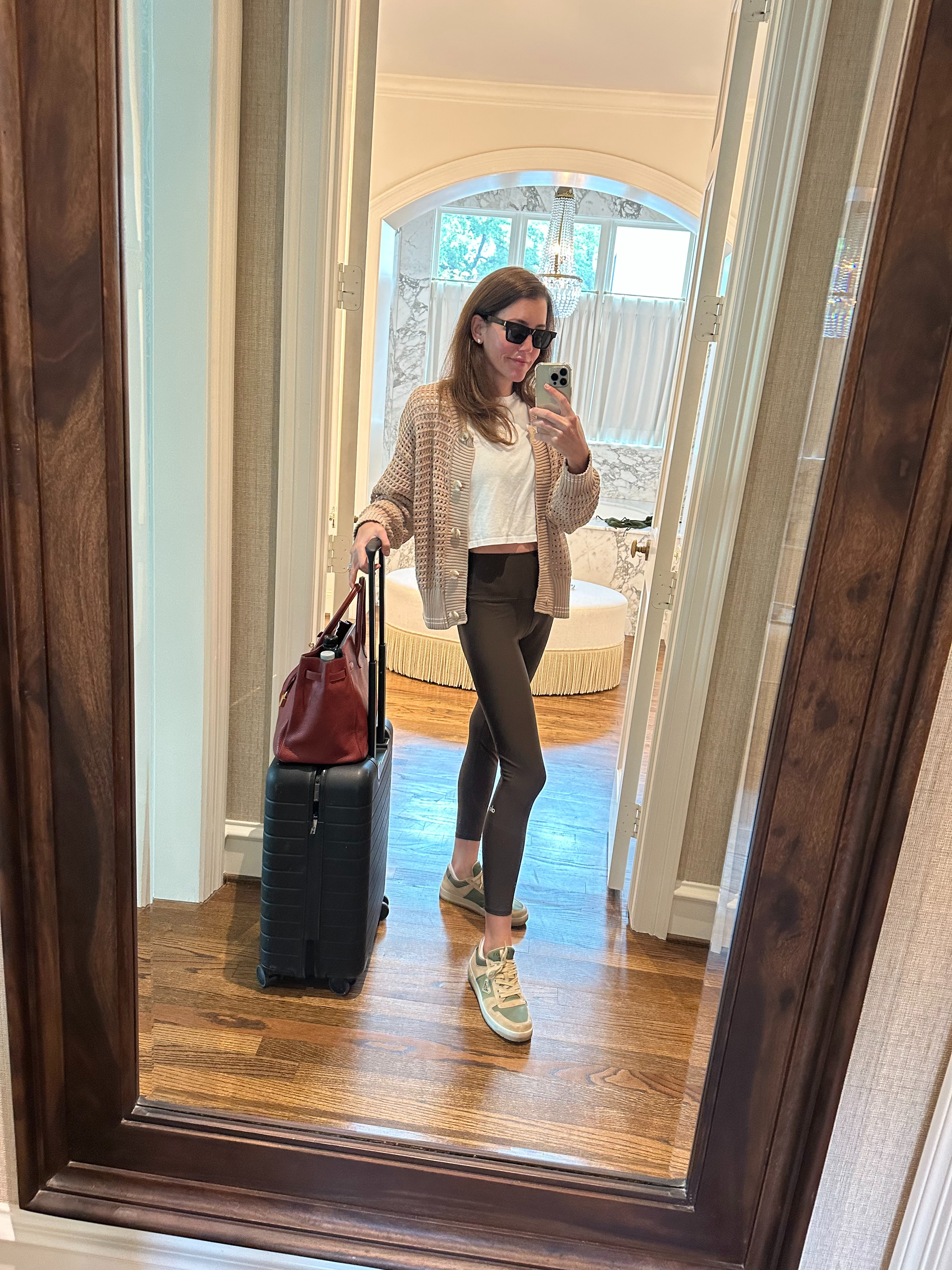saint laurent sunnies // varley cardigan /// wsly top // alo leggings // prada sneakers // away luggage // hermes bag  

 #LTKTravel