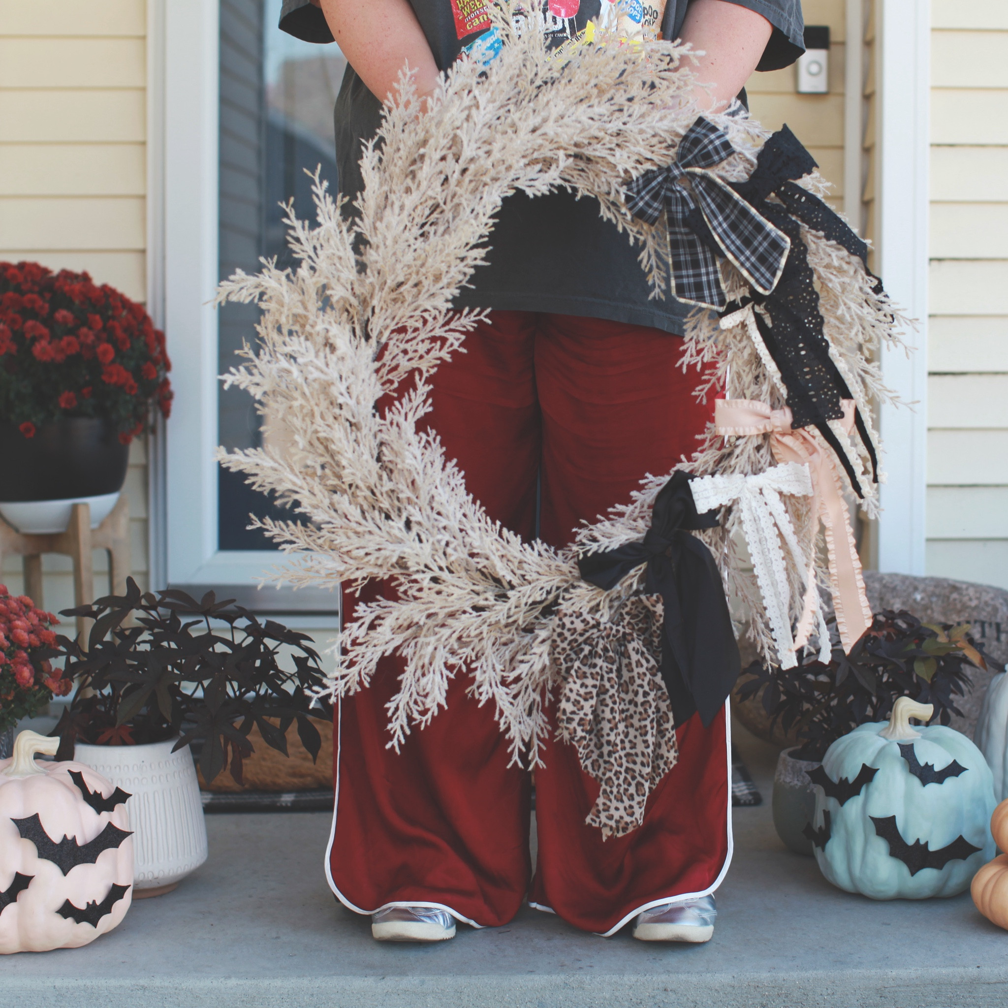 I had this idea to add bows to my faux wreath I got last year and I LOVE how it turned out. I grabbed several from Urban Outfitters (hair bows) that had different textures and patterns but all black, cream, leopard etc. They are hair bows so they had the clips already and clipped right on. It makes me smile every time I open the door to let our dog out and in 😍🖤 


#LTKHome #LTKHalloween #LTKSeasonal