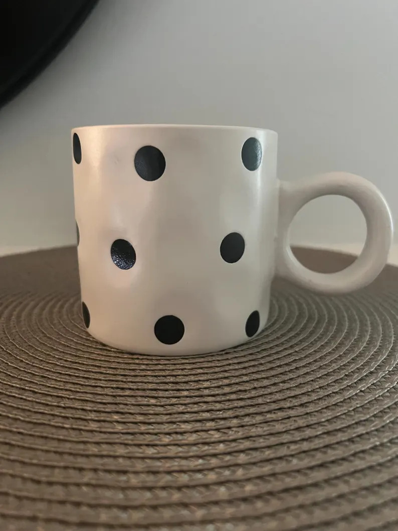 “A delightful coffee mug—enjoy your favorite drink.Dishwasher and microware safe | Etsy (US)