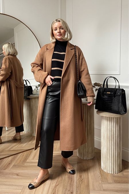 Styling leather trousers - cosy camel & black outfit. Striped knit from phase eight, mango belted coat, ballet flats & a black quilted bag!

#LTKshoecrush #LTKstyletip #LTKitbag