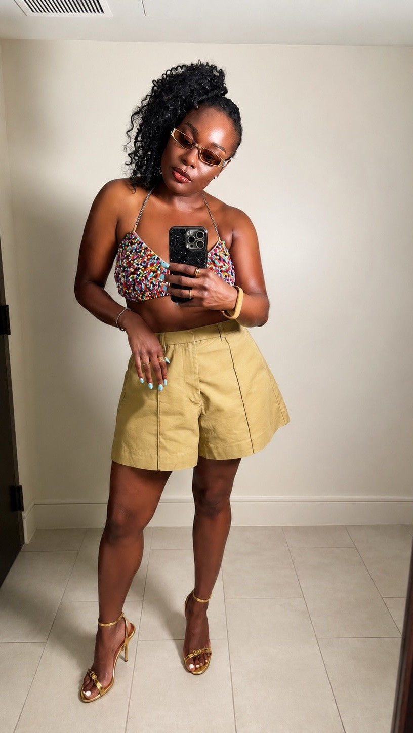 A fun top deserves a smart strategy. 🍬✨

The mistake most people make with statement pieces is adding more statement pieces.

Instead, I let the candy-inspired bralette have its moment and balanced it with structured khaki shorts and polished gold accessories.

That’s how you create an outfit that feels playful and elevated.

👚: @shopakira
🩳: @bykahlana
👠: @stevemadden 
👜: @amazon 

#WhatIWore 
#SincerelyGerine
#TheLookStrategist