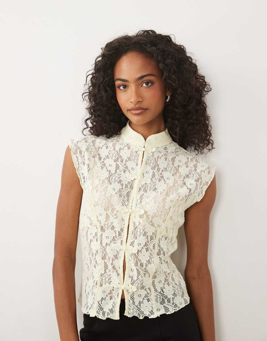 ASOS DESIGN lace rouleaux loop detail waist coat in yellow | ASOS (Global)