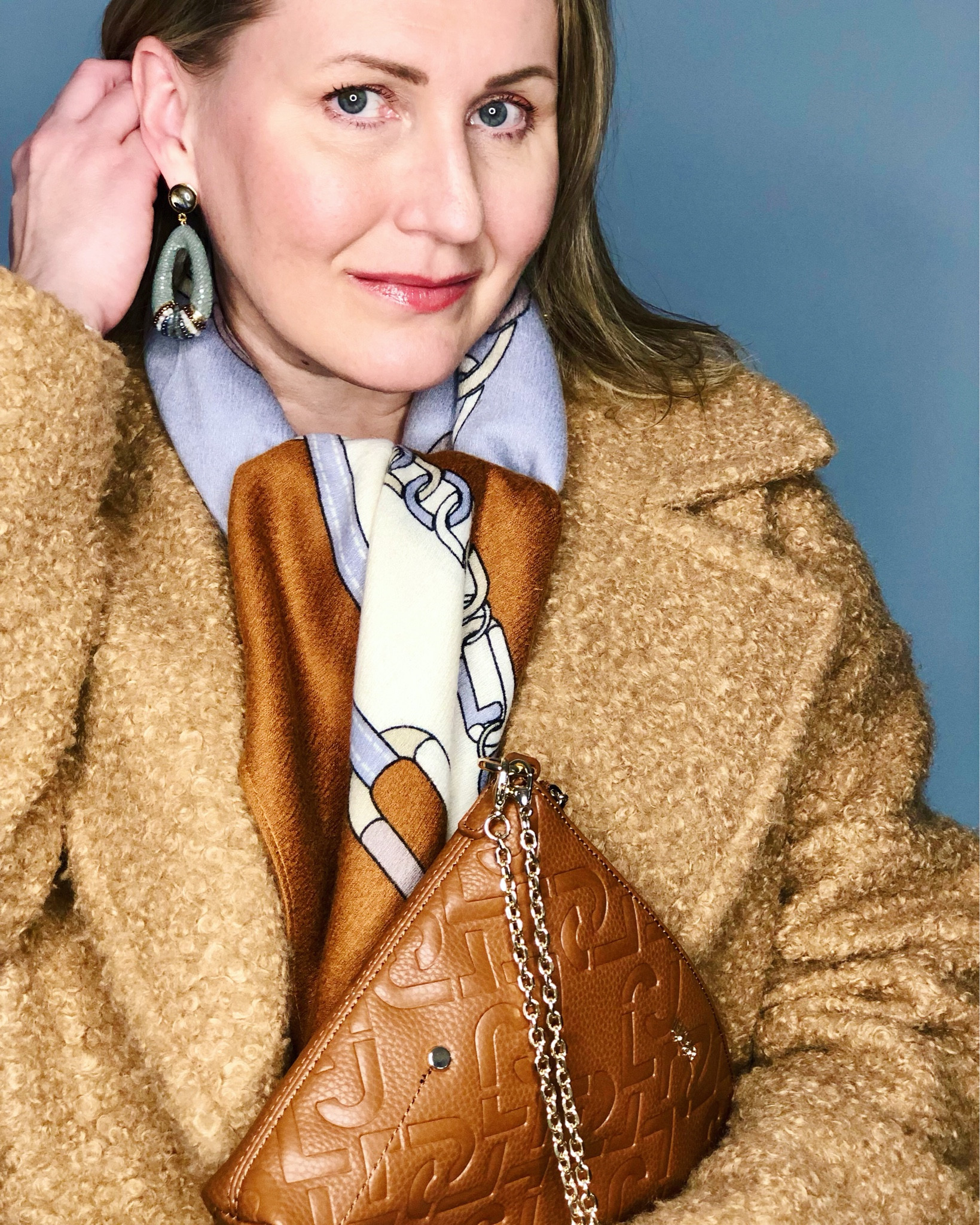 ✨Winter Trend Watch: Fluffy Coats ✨

Soften your lady-like work look with a cuddly teddy coat. This one is long and oversized in classic camel beige. It’s guaranteed to keep you warm in biting sub-zero temperatures without sacrificing the style. 

I matched mine with a chain print scarf and a monogram clutch with chain. 

Teddy coat, faux fur coat, textured coat, beige coat, neutral coat, long coat, oversized coat

#LTKstyletip #LTKeurope #LTKworkwear