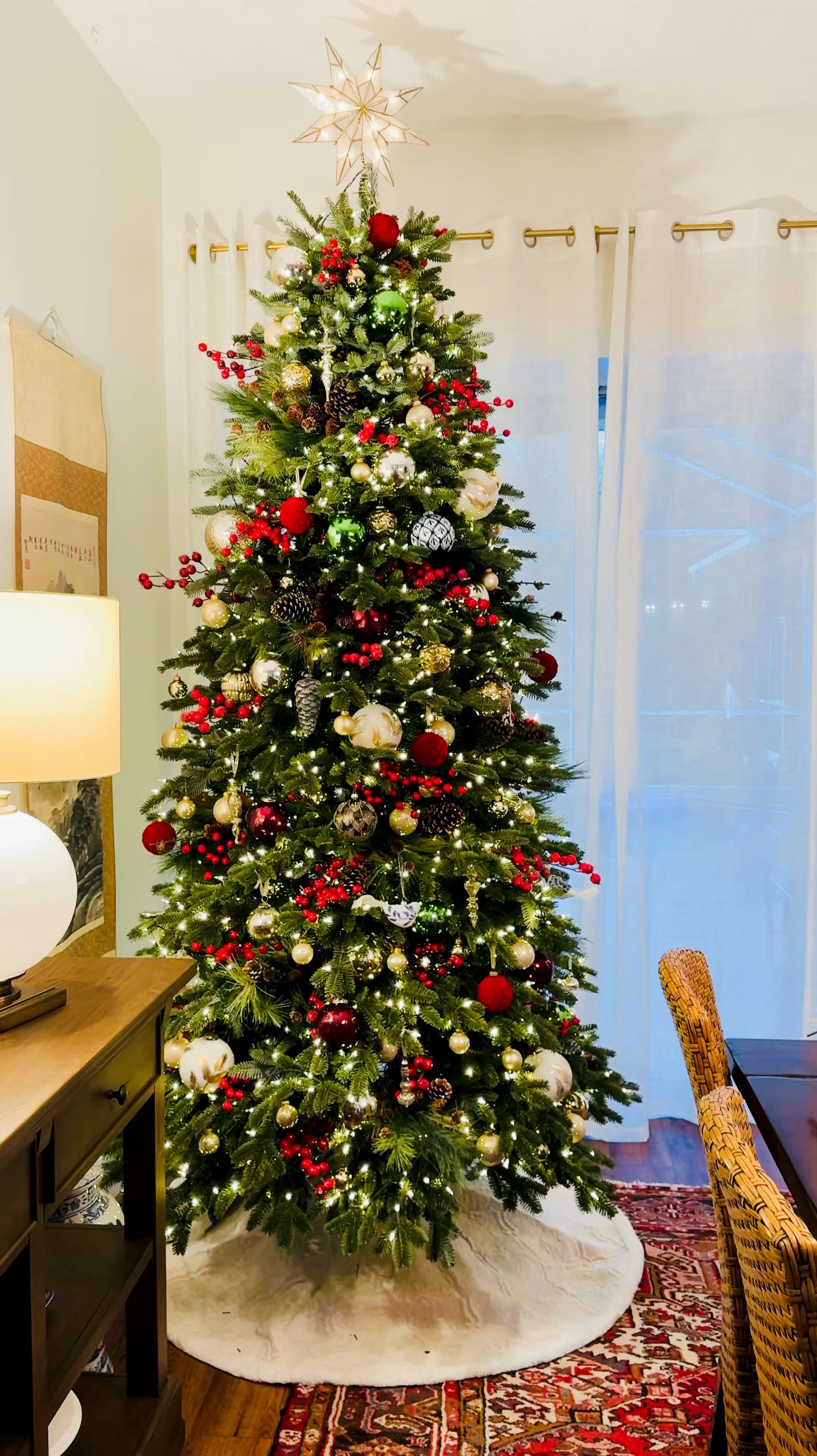 Christmas tree and decorations, red berries, pine cone greens, Christmas ornaments 

#LTKSeasonal #LTKHoliday #LTKHome