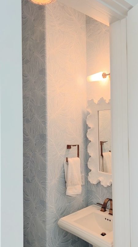 Coastal bathroom wallpaper. Modern coastal home decor. Powder room decor. 

#LTKVideo #LTKhome #LTKstyletip