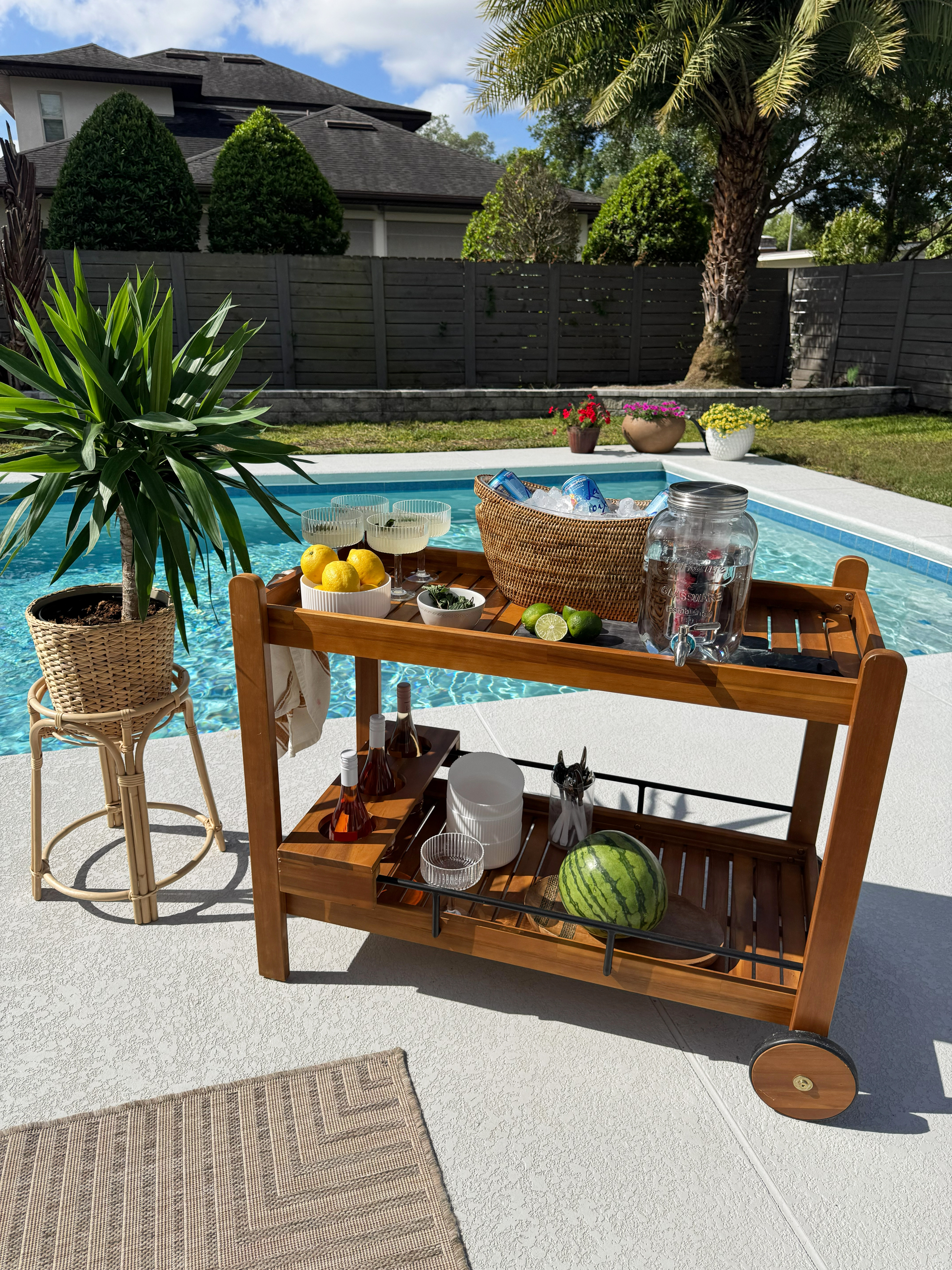 #ad I love our bar cart from @Wayfair  I have used it for so many different occasions along with the adorable rattan ice bucket, shatter free glassware, serving bowls and more! Such the perfect finds for an outdoor hosting this Summer!

#wayfairpartner #wayfair #wishyourwerehere #outdoor @wayfair 

 