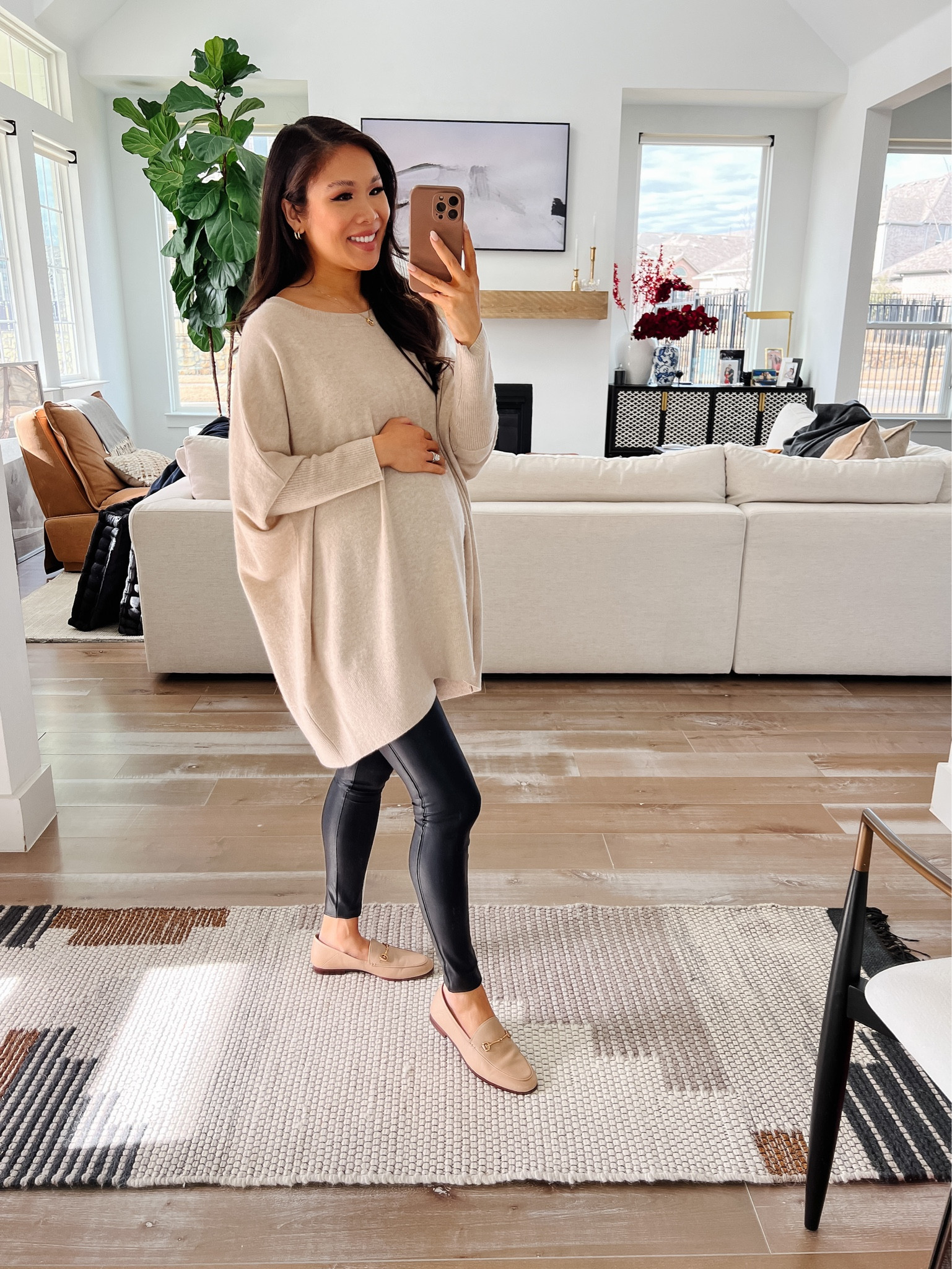 Smart casual outfit with spanx faux leather leggings and maternity beige cashmere sweater in size XS. Love this look for early spring and it is so comfortable! Paired with loafers to dress it up, but would look cute with white or neutral sneakers! Linking similar non-maternity sweaters, home decor and more. 

#LTKstyletip #LTKbump