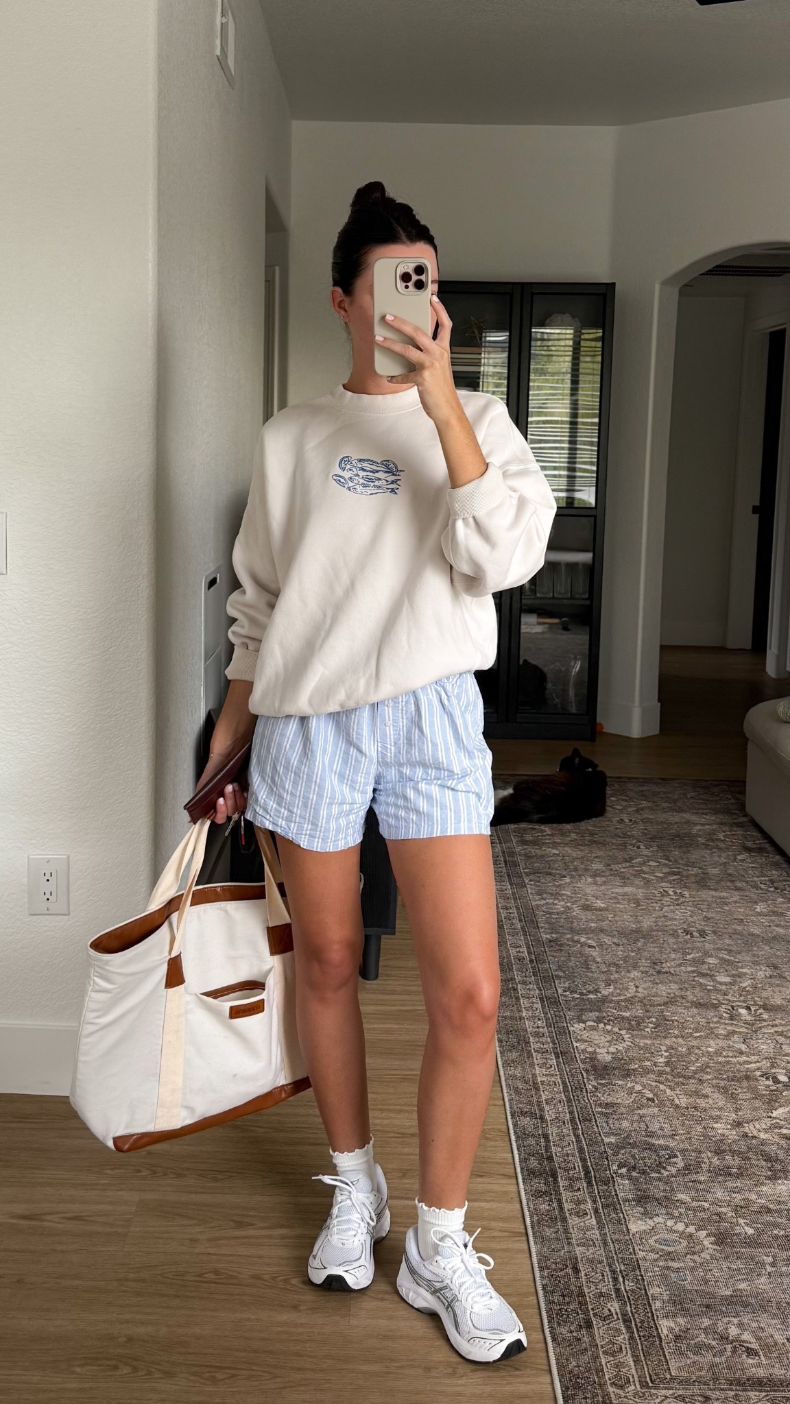 Outfit of the morning! Shorts are one size with a stretchy waistband. Wearing size small in the sweatshirt  

#LTKStyleTip #LTKSeasonal #LTKFindsUnder100