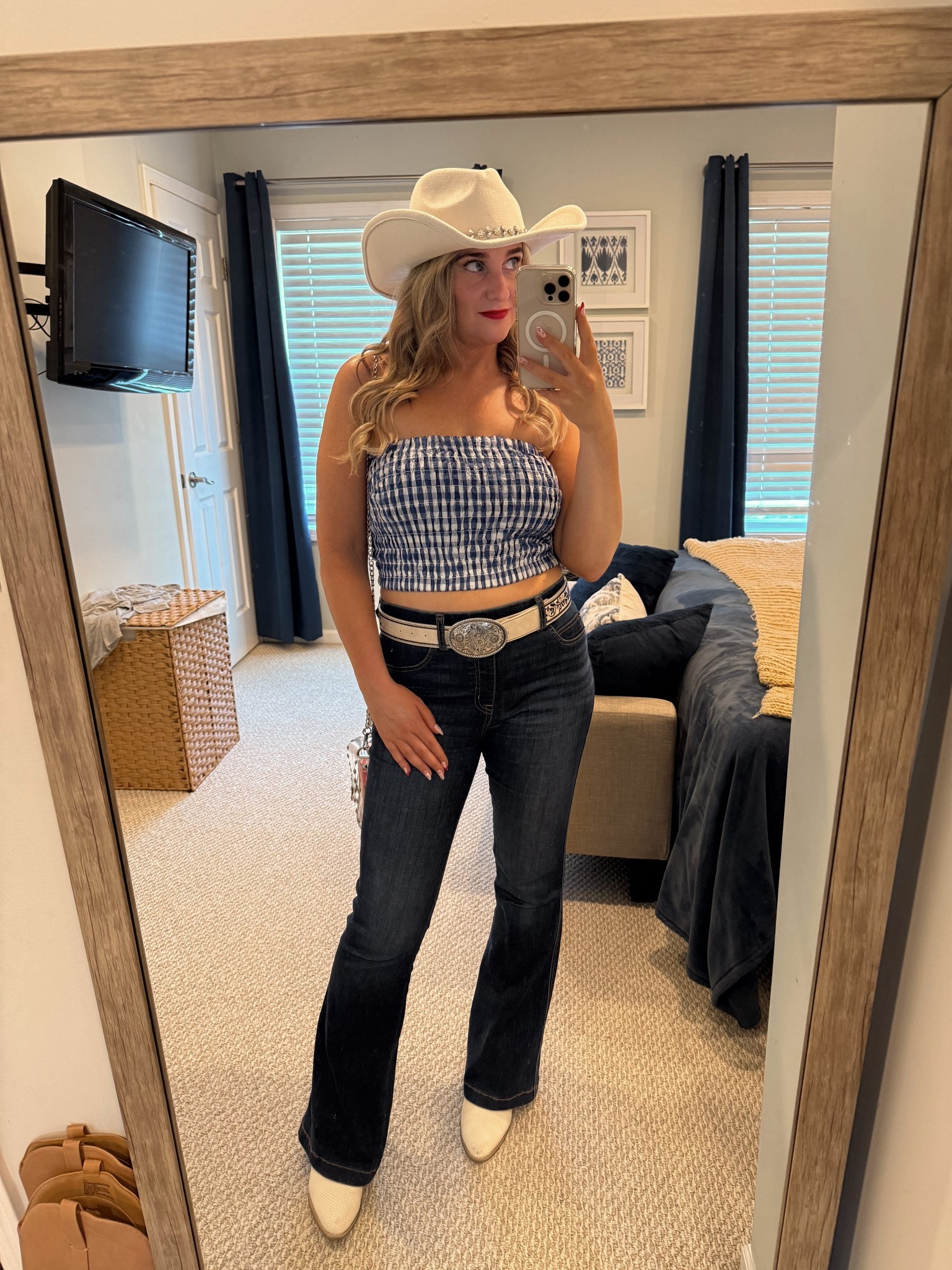 Country concert outfit with cowboy hat and spanx jeans. Wearing a medium petite in the jeans. Top is a medium  

#LTKFindsUnder50 #LTKSeasonal #LTKStyleTip