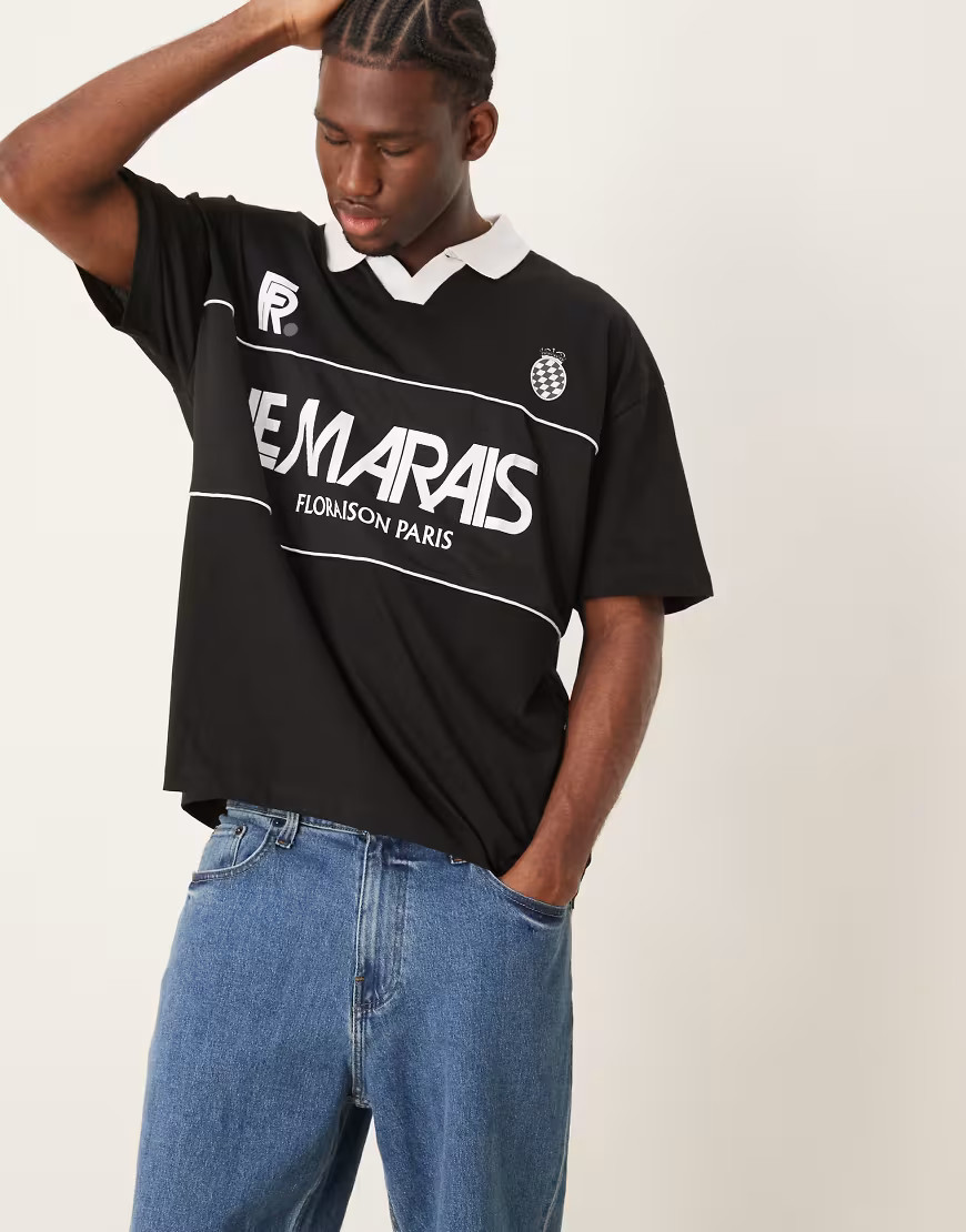 ASOS DESIGN oversized polo with sports graphic in black | ASOS (Global)