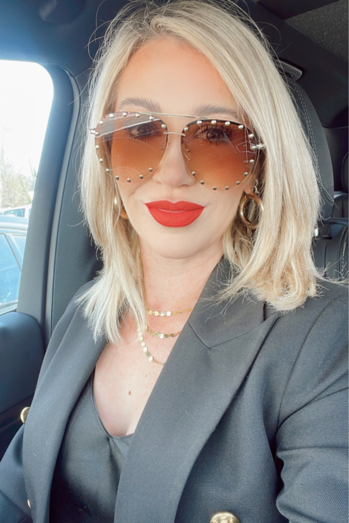 These sunglasses are my new favorite. I love the gradient, LOVE the stud detail and I love that they aren’t too dark. 😎

Wearing size 8 in the blazer

Lip is shade ‘comin in hot’ 💋

#LTKunder50