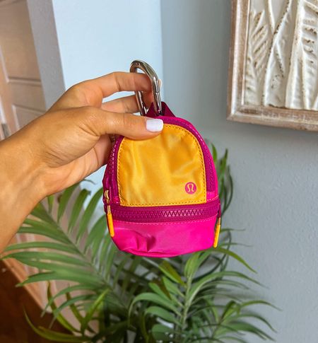 The cutest lil backpack🎒 I use this for chargers and AirPods! Clips on my work backpack and holds all the essentials 😊

#LTKFind #LTKtravel #LTKunder50