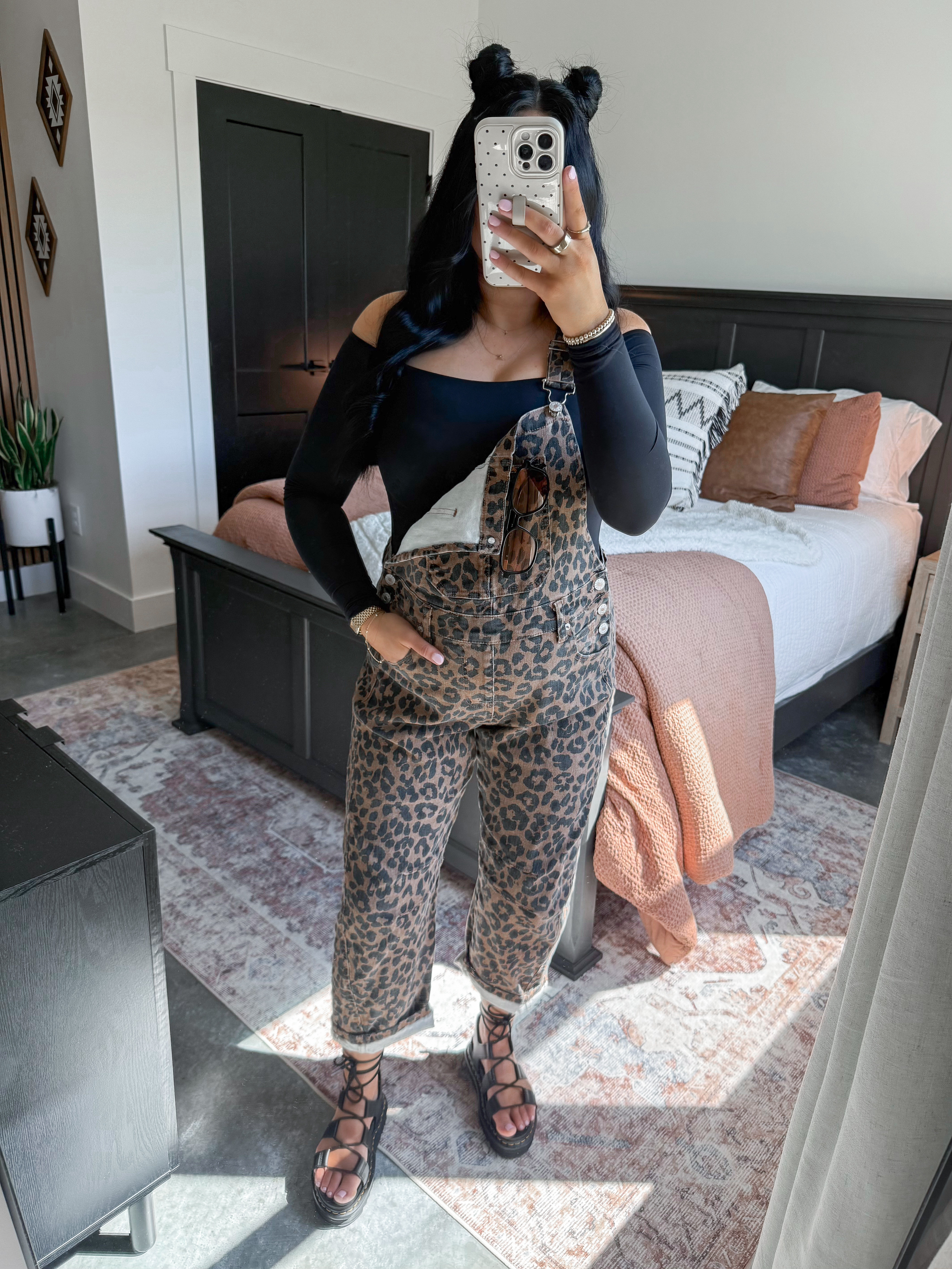 Bump Friendly Spring Overalls Outfit 🐆

Top - small
Overalls - small (they work great with my 33+ week bump!)

Shared this exact outfit last year and it was a total hit! 👏🏼 I love the looser fit of these overalls (& they do have a subtle barrel style leg!) I paired them with this black off the shoulder long sleeve top for those cooler spring days, but you could also swap it out for a short sleeve version of this top for the warmer days! Finished the look with my strappy Dr. Martens sandals & the cutest amazon sunglasses! 

#springoutfit #casualoutfit #bumpfriendly #bumpstyle #springfashion  

 

#LTKootd #LTKBump