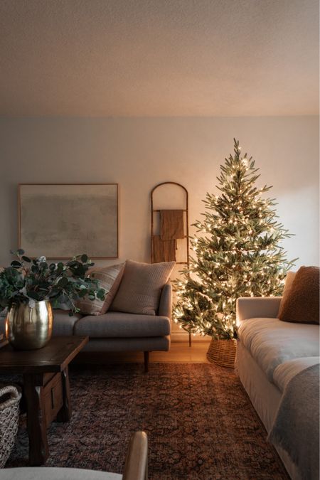 Our Christmas living room! This is my favorite faux tree. So realistic! We have 8’ ceilings and the 6.5’ tree 

#LTKHoliday #LTKSeasonal #LTKhome