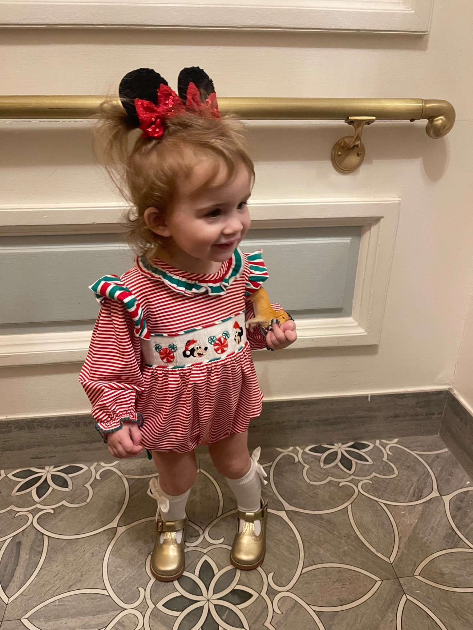 🎅🏻 Disney Christmas Cutie 🎀

Caroline’s ready for the Merriest Place on Earth in her precious Smocked Santa Mouse red stripe bubble from The Smocked Flamingo 🎄🐭 I paired it with the sweetest embroidered mouse bow socks, shiny gold Mary Janes, and sparkly mouse ear clips for a Minnie-inspired holiday moment that’s picture-perfect for Disney days, Santa brunches, or Christmas cards. ❤️💚

Everything is linked so you can recreate this festive look for your little one — from her ruffle smocked bubble to the glittery bows on her ears! 🎁✨

🎀 Outfit details:
	•	Smocked Santa Mouse Red Stripe Bubble – The Smocked Flamingo
	•	Embroidered Mouse Bow Socks – The Smocked Flamingo
	•	Toddler Mary Janes with Bow – Amazon
	•	Sparkly Mouse Ear Clips – Amazon

⸻

Disney toddler Christmas outfit, Minnie Mouse holiday outfit, baby girl smocked Christmas bubble, toddler girl Christmas photo outfit, holiday family trip to Disney, Christmas Minnie ears for toddlers, gold Mary Jane toddler shoes, matching holiday outfits for little girls, festive smocked baby clothes 🎅🏻💫

#LTKKids #LTKTravel #LTKHoliday
