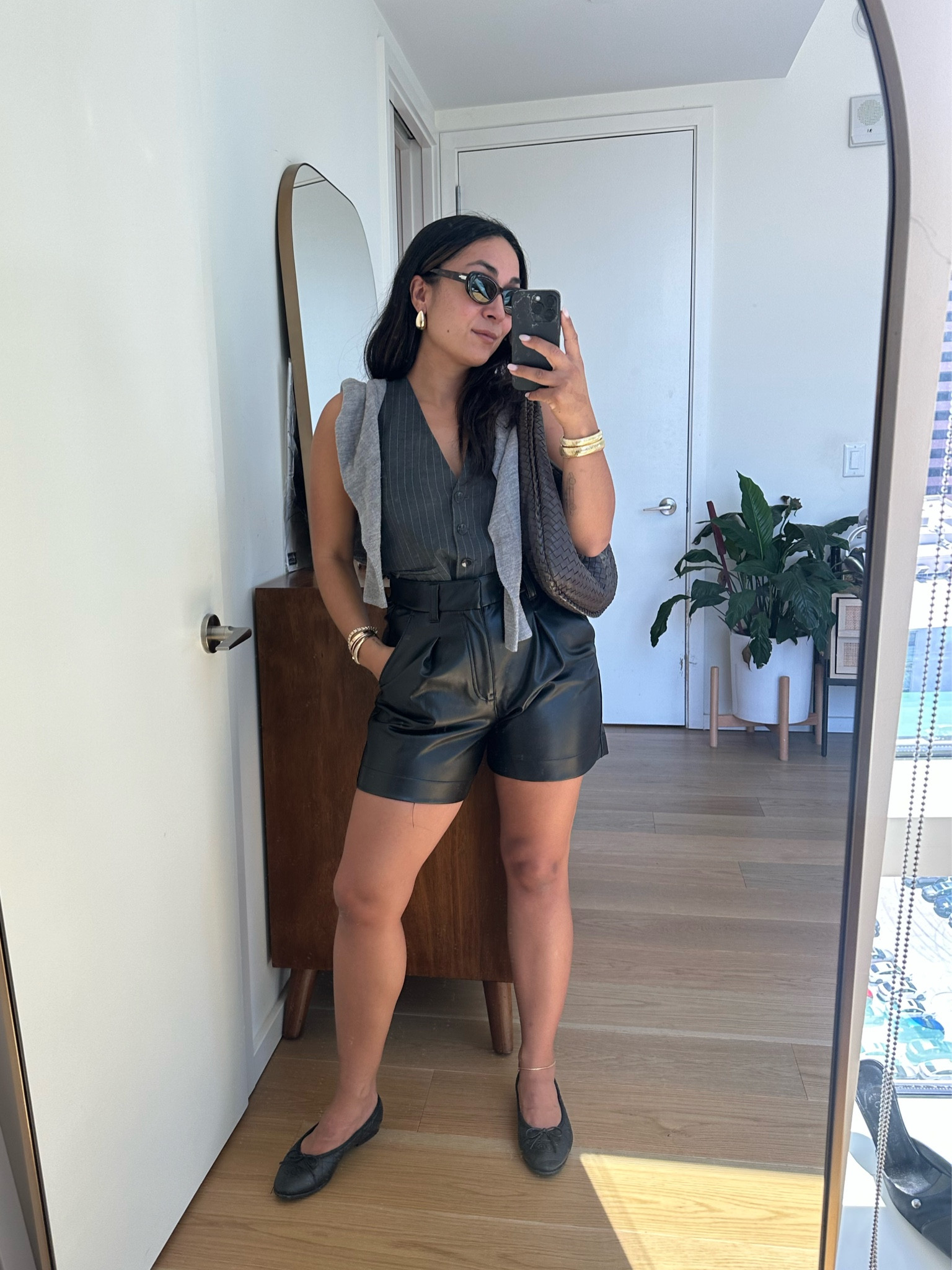 Fall Transitional outfit idea: Faux leather shorts & Vest outfit idea for a cute and chic look. 

#LTKstyletip