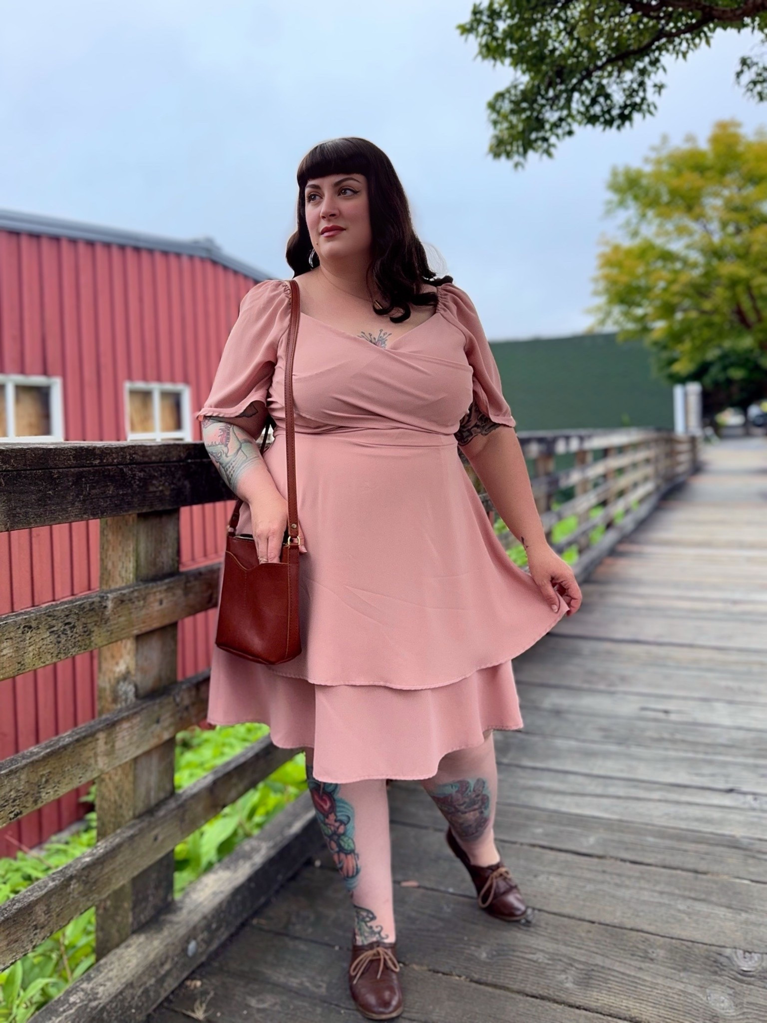 Plus size blush pink dress with tiered skirt and flutter sleeves

#LTKPlusSize #LTKFindsUnder50 #LTKWedding