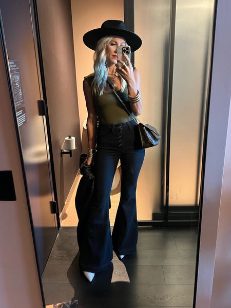 Obsessed with these black flare jeans. In a size 1 for reference. This green bodysuit is so perfect for fall and pairing my fav fall white booties and wide brim hat  

#LTKstyletip #LTKSeasonal #LTKfindsunder100