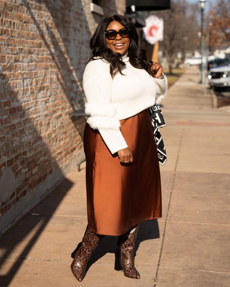 Looking for some winter inspiration? ✨ I love this satin midi skirt and sweater for a weekend outfit. 

I’m wearing a size 18 sweater and 2X skirt 

#LTKcurves #LTKstyletip #LTKunder50