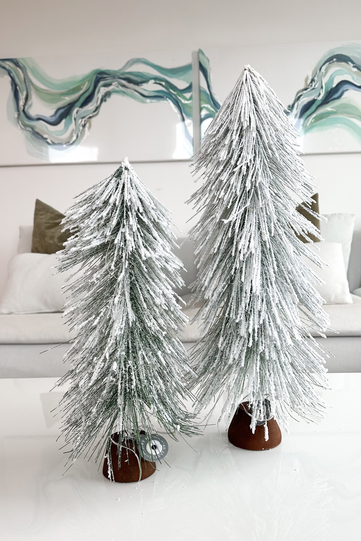 Flocked tabletop artificial Christmas trees with battery operated lights from Target

#LTKunder50 #LTKHoliday #LTKSeasonal