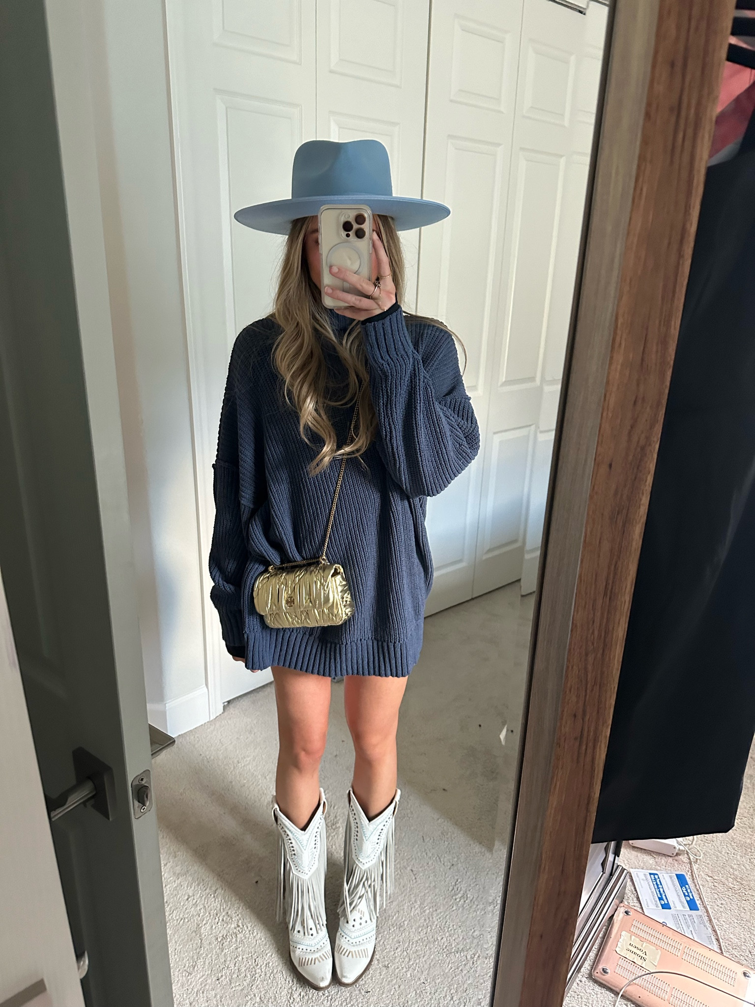 Aerie sweater. Lack of color blue hat. Rollas denim shorts. Dingo boots. Fringe boots. Cowboy boots. Tory Burch gold purse. Lighting hockey game. Hockey game  

#LTKshoecrush #LTKstyletip #LTKfindsunder100