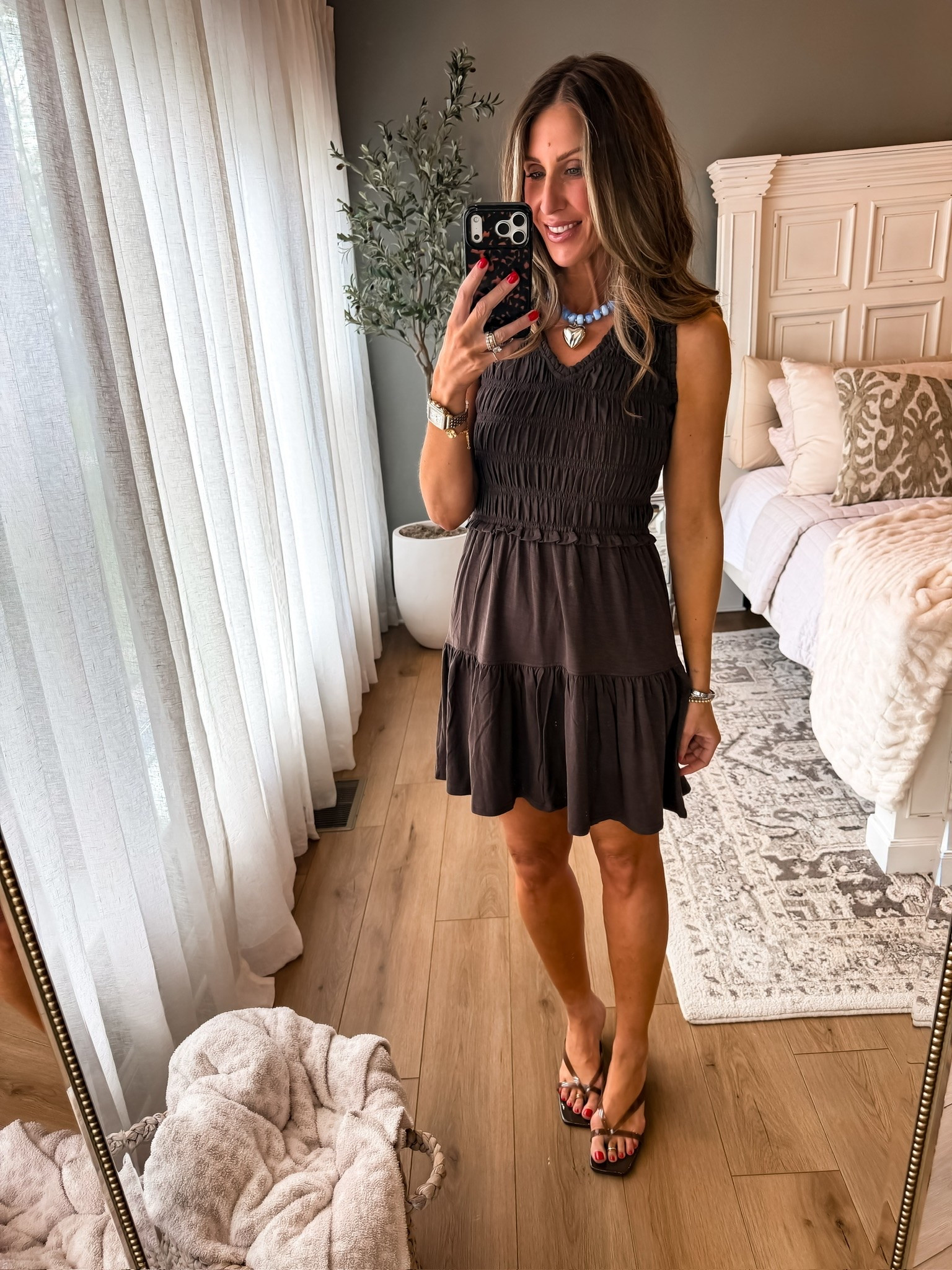 this little chocolate brown dress is one of those throw on and instantly feel cute outfits. the smocked detail is so flattering and I love it paired with a fun colorful necklace for summer.

brown dress, summer dress outfit, chocolate brown trend, casual chic style, vacation outfit, date night dress, smocked dress, neutral fashion, summer outfit inspo, effortless style, everyday dress, themominstyle

#LTKmomlife #LTKootd #LTKSeasonal
