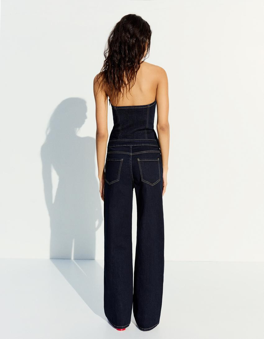 Long denim jumpsuit - BERSHKA LOVERS - Women | Bershka UK