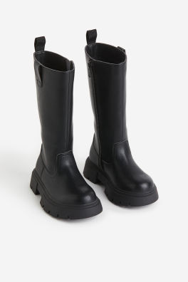 -40%
	
				SAVE AS FAVOURITE
	

	
	Knee-high boots
        
£18.00
	£29.99

	
				Black
	
				
... | H&M (UK, MY, IN, SG, PH, TW, HK)