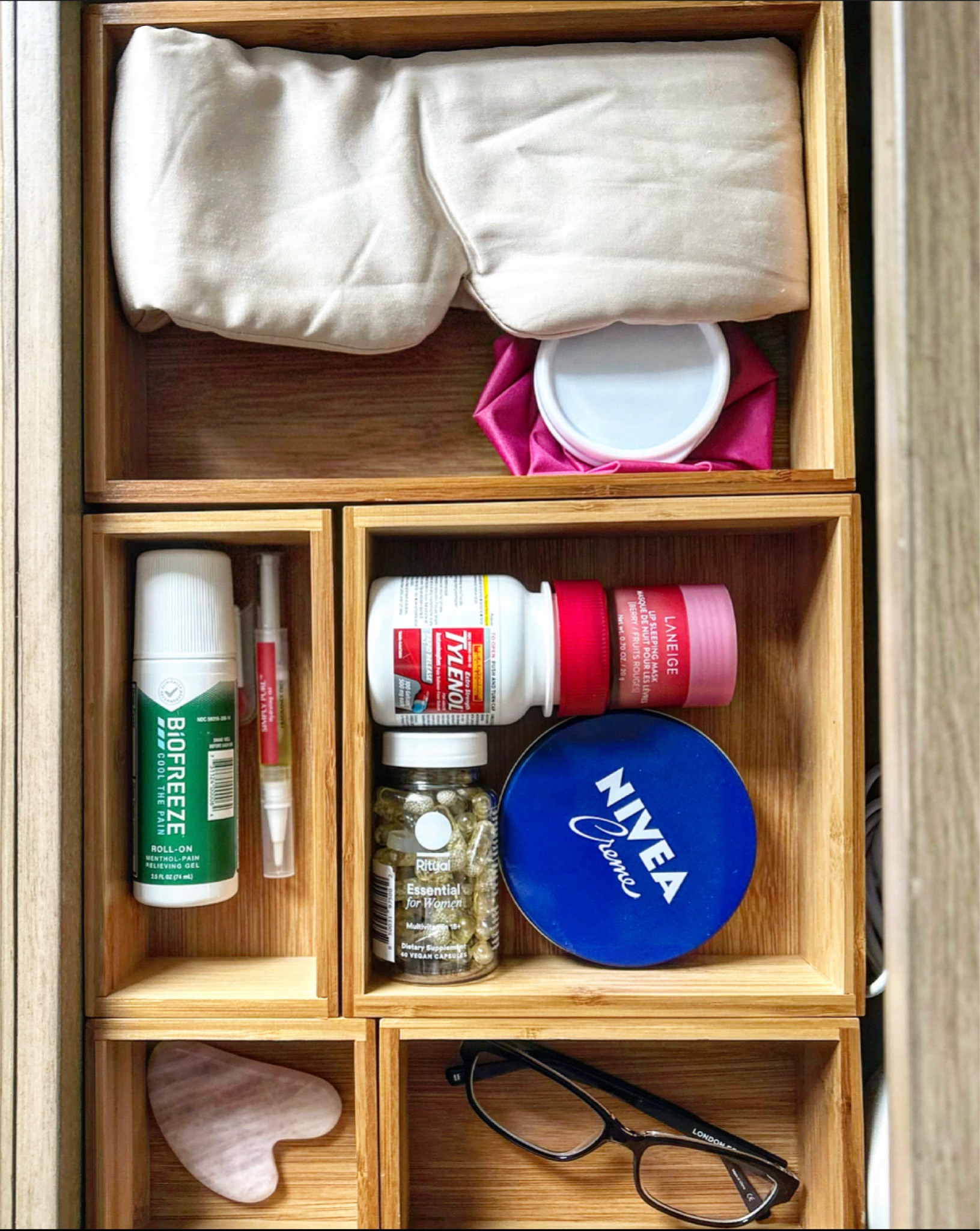 There is nothing more therapeutic to me than organization. Having a clutter free home truly gives me a clutter free head 😂 I love having all of my essentials organized. My nightstand is just how I want it now 🩷 Essentials:  -night mask  -I’m a headache girly so my Tylenol, icy hot and ice pack are a must 🫠 -ritual womens multi  -Nivea crème  -glasses  -cuticle oil -laniege lip sleeping masking  -gua sha facial massage stone  #nightstand #organization #bedtime #laniegelipmask #nightstandnecessities #nightstandorganization

#LTKhome #LTKbeauty #LTKGiftGuide