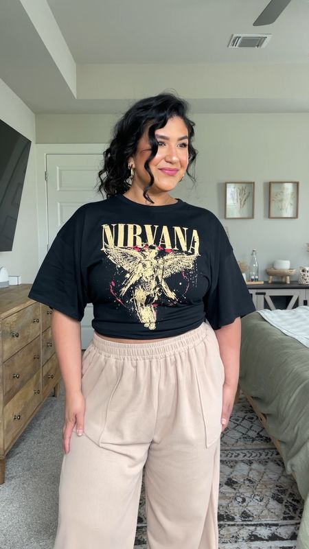 Comfy Amazon outfit! I’m 5’1”, size 10-12. Nirvana tee, I sized up to an XL for an oversized fit. Pants, these run small, size up, I’m wearing the XL. Shoes size up 1/2 size. Wearing a large in the purple oversized tee. 

#LTKFindsUnder50 #LTKVideo #LTKMidsize
