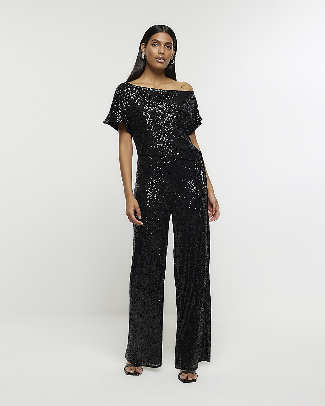 Black sequin tie side jumpsuit | River Island (UK & IE)