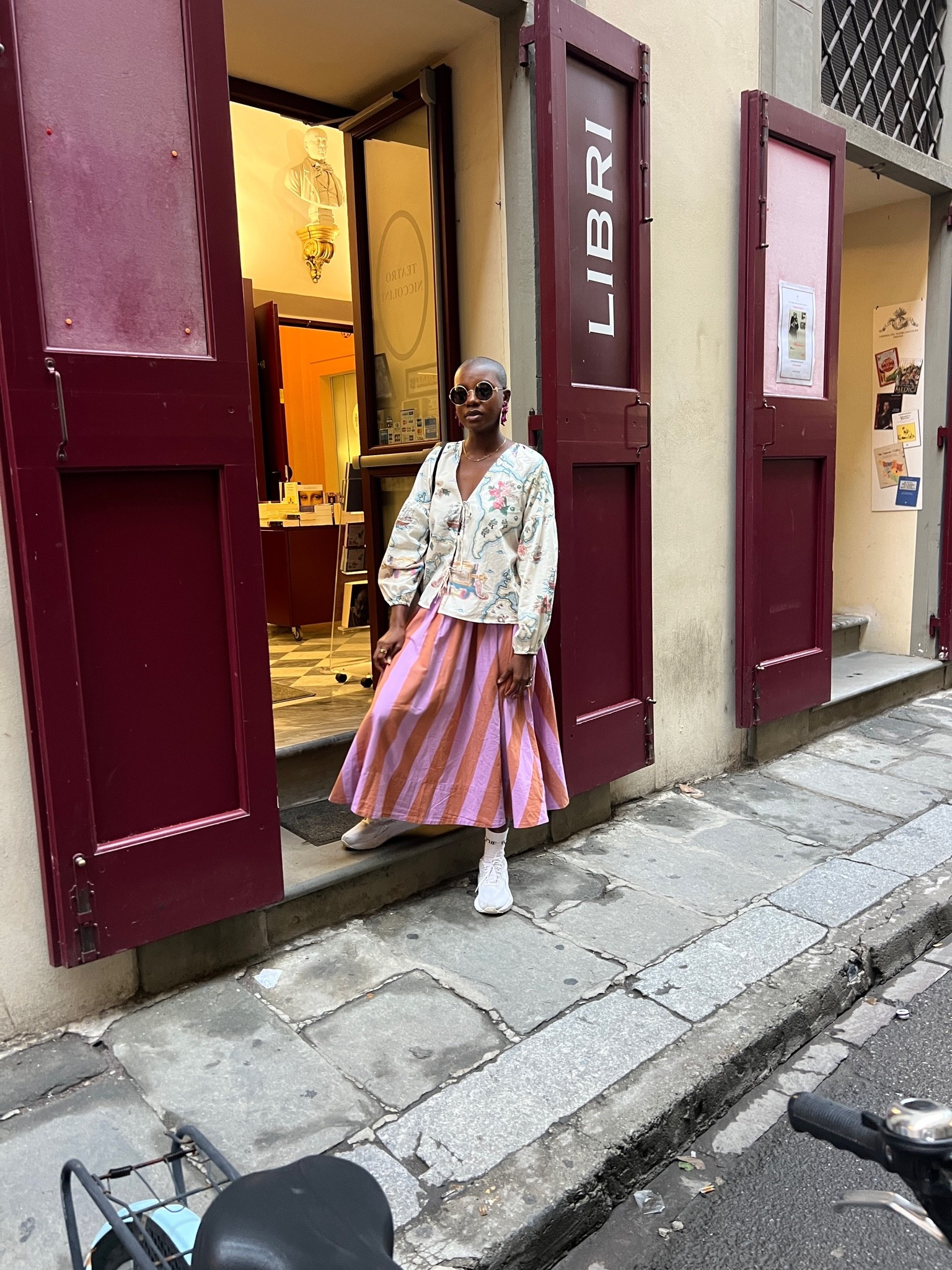 Outfit from my trip to Italy! Striped midi skirt, front tie blouse with map design.

#LTKgrwm #LTKootd