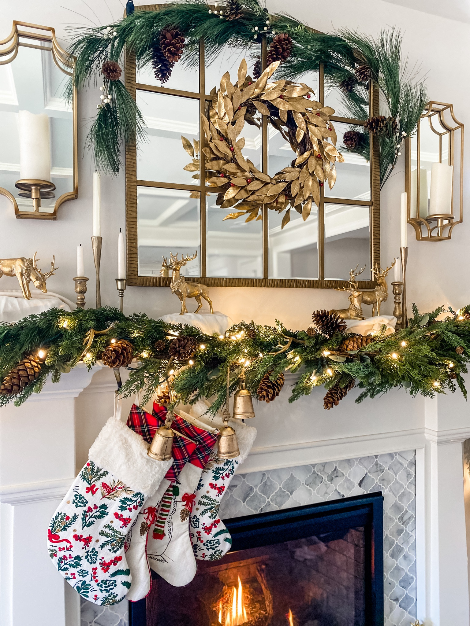 Fireplace mantle decor for Christmas and the holidays! Garland stockings candle holders wreath lights deer etc!

#LTKSeasonal #LTKhome #LTKHoliday