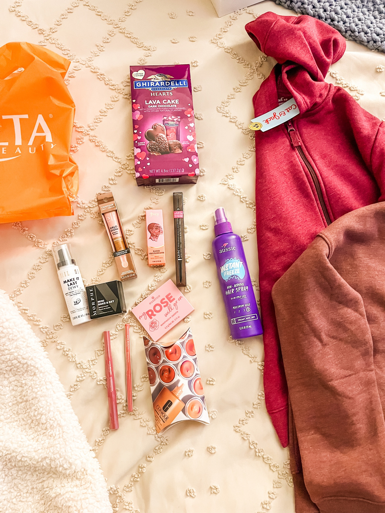 My “haul” from the day! Mostly make up and then had some returns for Otto because he got a few things for Christmas he already had for clothes —so swapped them out and then grabbed some hairspray and some chocolates on my way out 😍