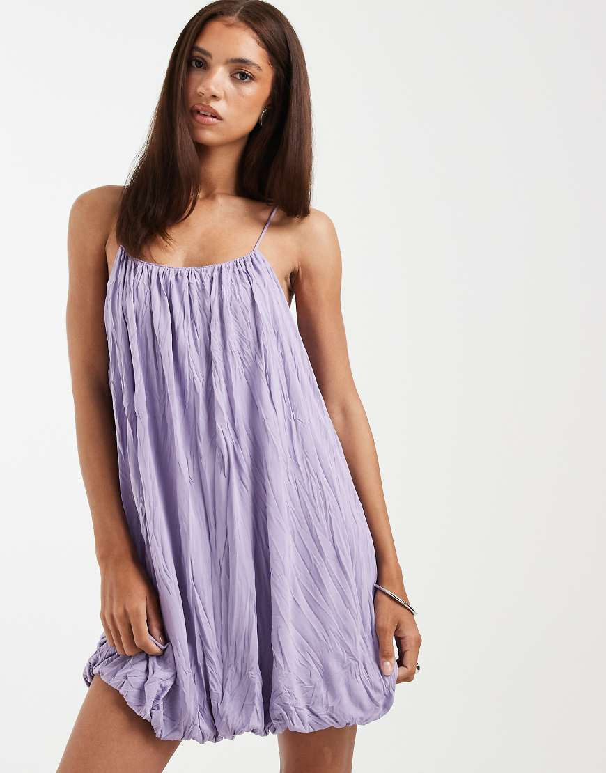 ASOS DESIGN – Minikleid in Flieder mit Knitterstruktur und Ballonsaum-Lila | ASOS (Global)