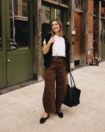How to style barrel jeans this spring for warmer days: a tucked in tee, a belt, ballet flats, and a sweater over your shoulders

Everlane, barrel jeans, style help, ballet flats 

#LTKstyletip #LTKfindsunder100 #LTKSeasonal