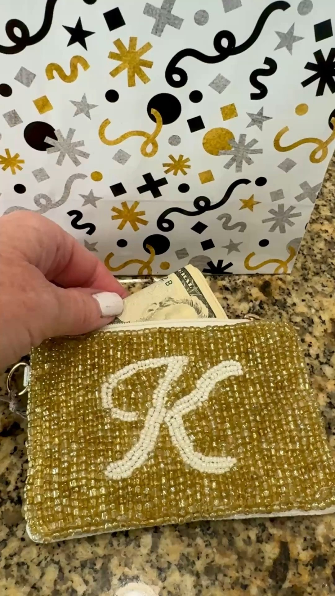 I’m always trying to find creative ways to gift cash so when I found these cute beaded wallets at Target, I knew they would be perfect. The monogram makes them even more personal.

#LTKU #LTKSeasonal