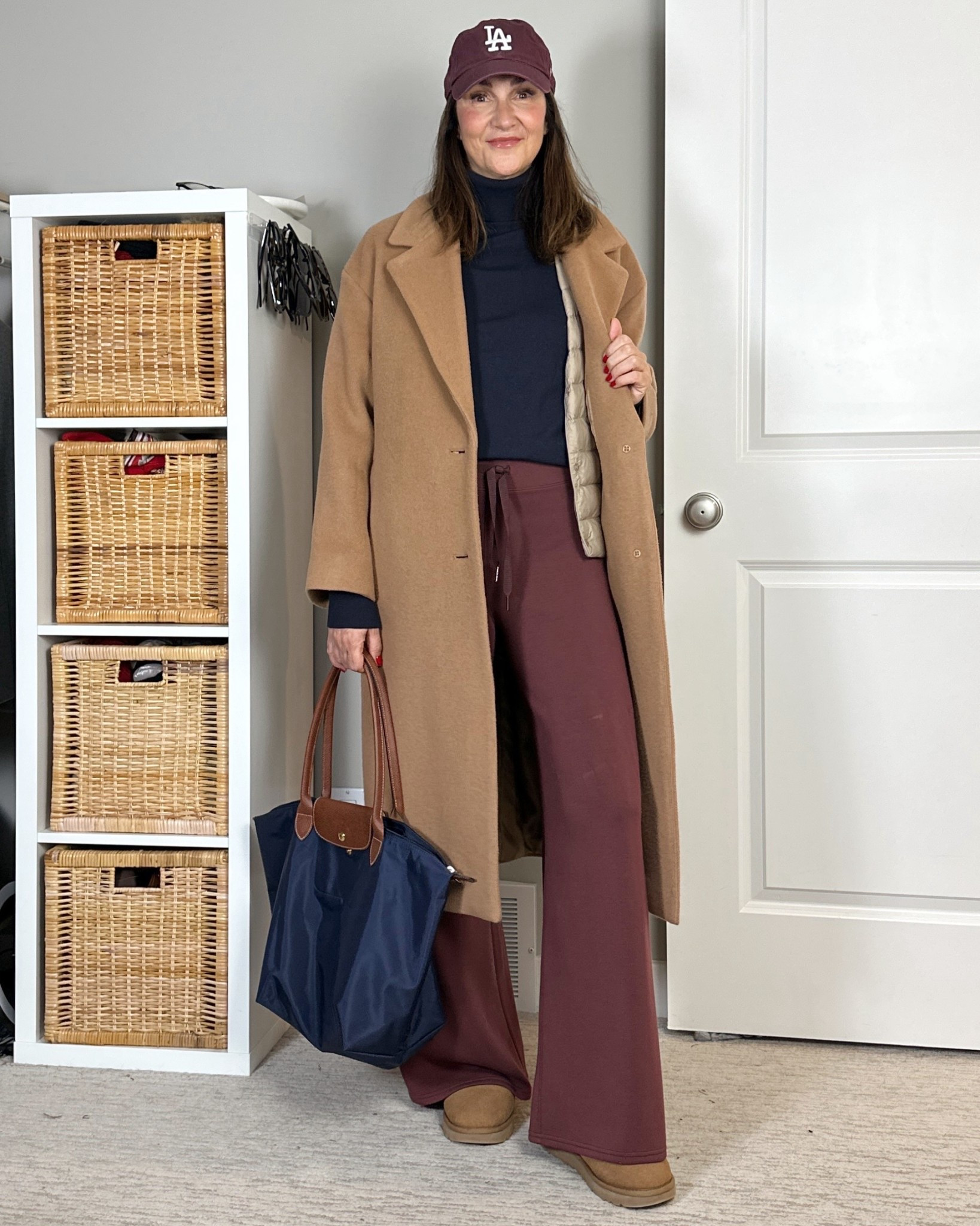 Chilly day outfit with a hidden extra layer! 
This thin puffer vest has a button to fold under the collar so it doesn’t show under another coat. You can also wear it on its own. (won’t show in stock until you pick a color)
I’m 5’ 7” wearing my usual size S in the vest and my all time fave wool camel coat.
Also wearing S in the Spanx AirEssentials pants (10% off with code CBSTYLEDXSPANX for new customers) and a men’s S in the turtleneck sweater. 
Uggs fit tts (if you’re between, size down, they might feel snug at first but they stretch out and the wool inside gets compacted down).


#LTKFindsUnder100 #LTKootd #LTKSeasonal