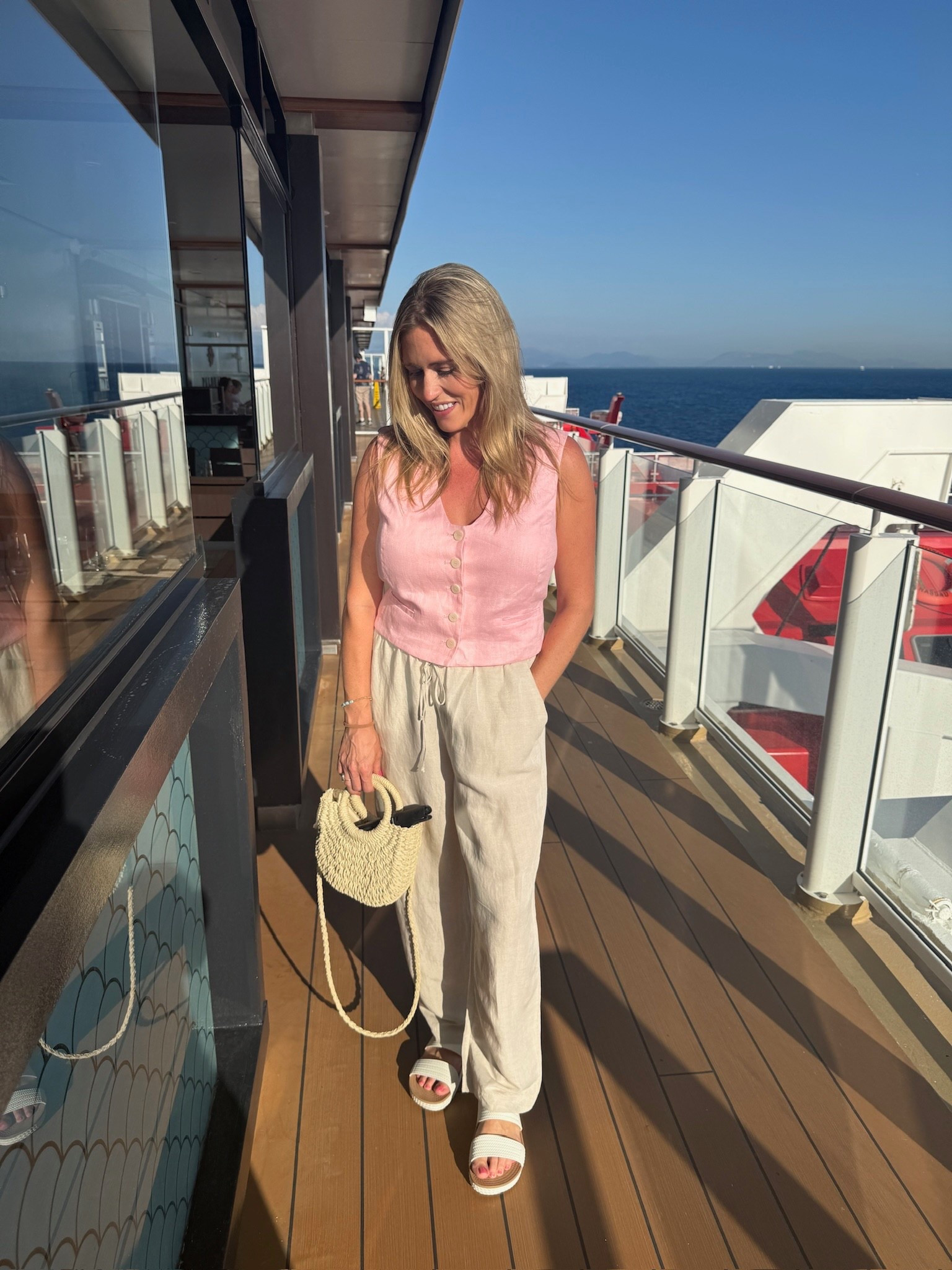 This soft pink top and linen pants combo was perfect for an evening dinner on vacation! 

#LTKTravel #LTKStyleTip #LTKSeasonal
