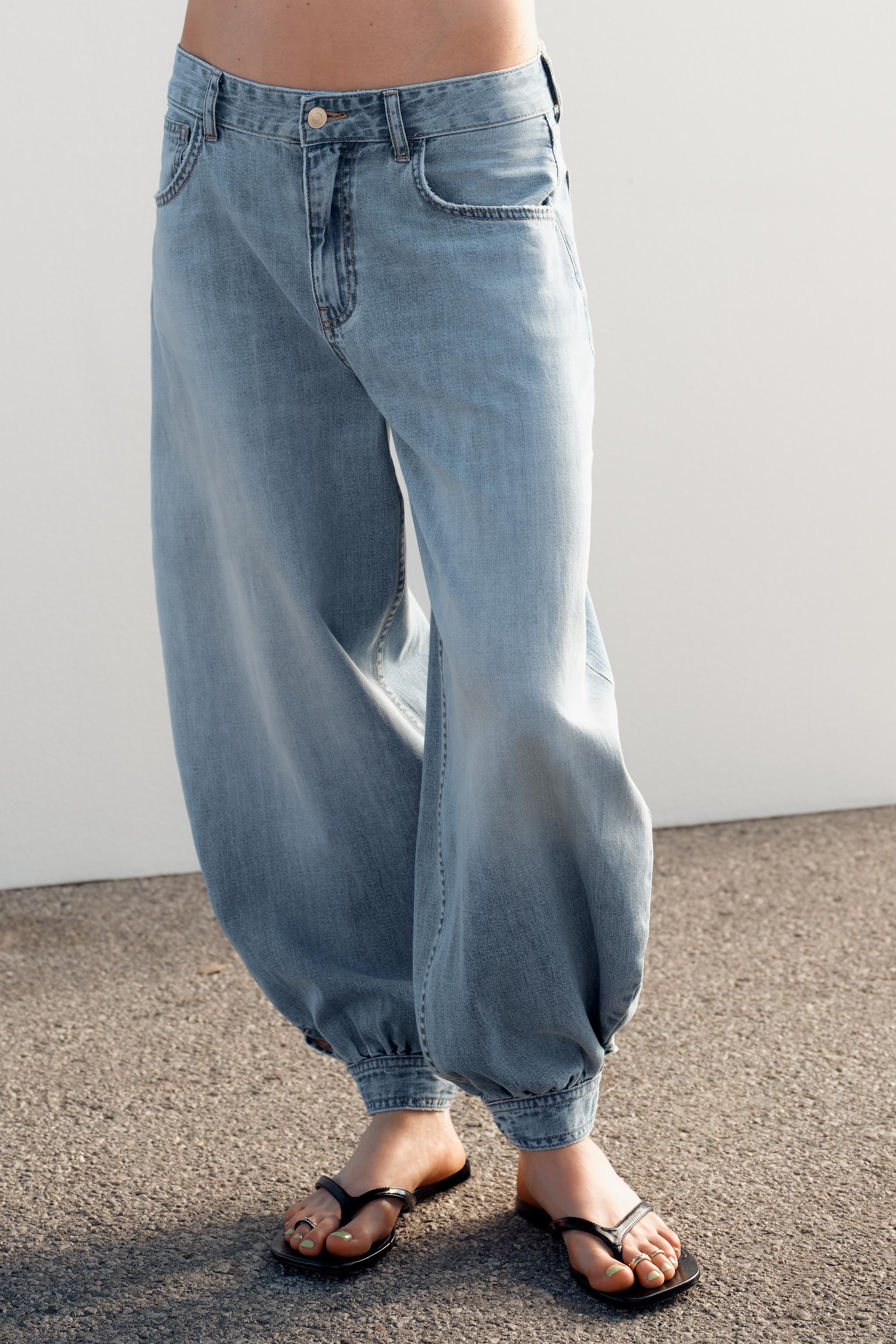 TAILLE NORMALE - COUPE BALLONJean taille normale avec passants et cinq poches. Bas resserré avec... | Zara US