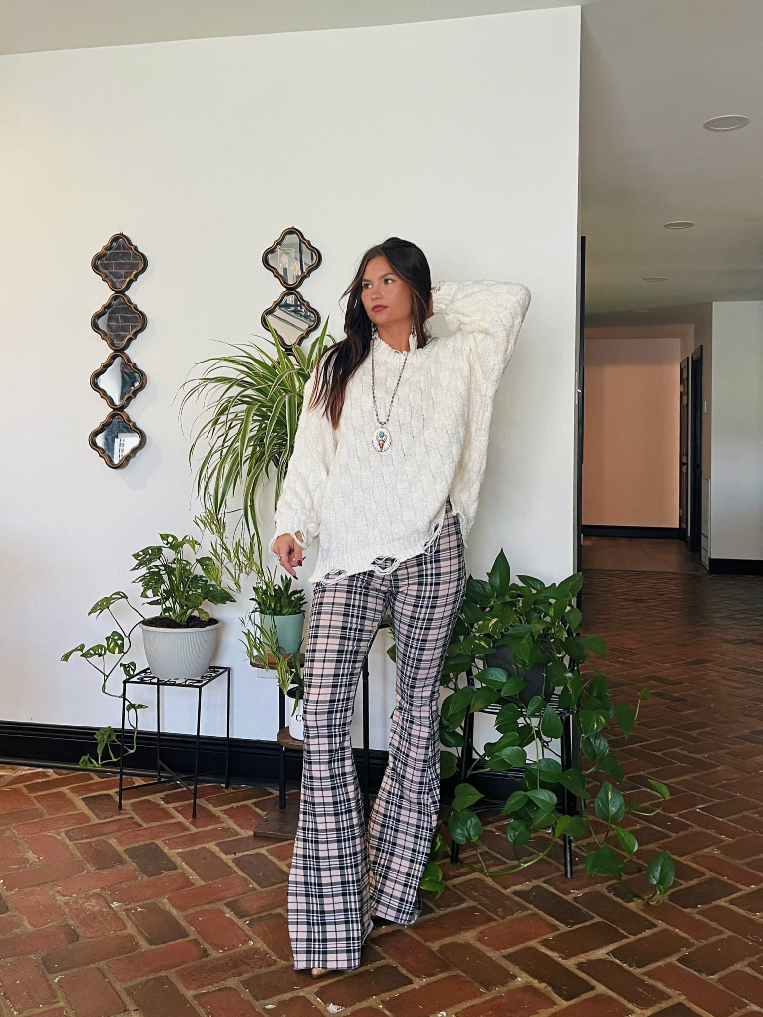 Soft and cozy distressed white sweater paired with plaid flares! LORI20 to save



#LTKStyleTip #LTKFindsUnder100 #LTKFallSale