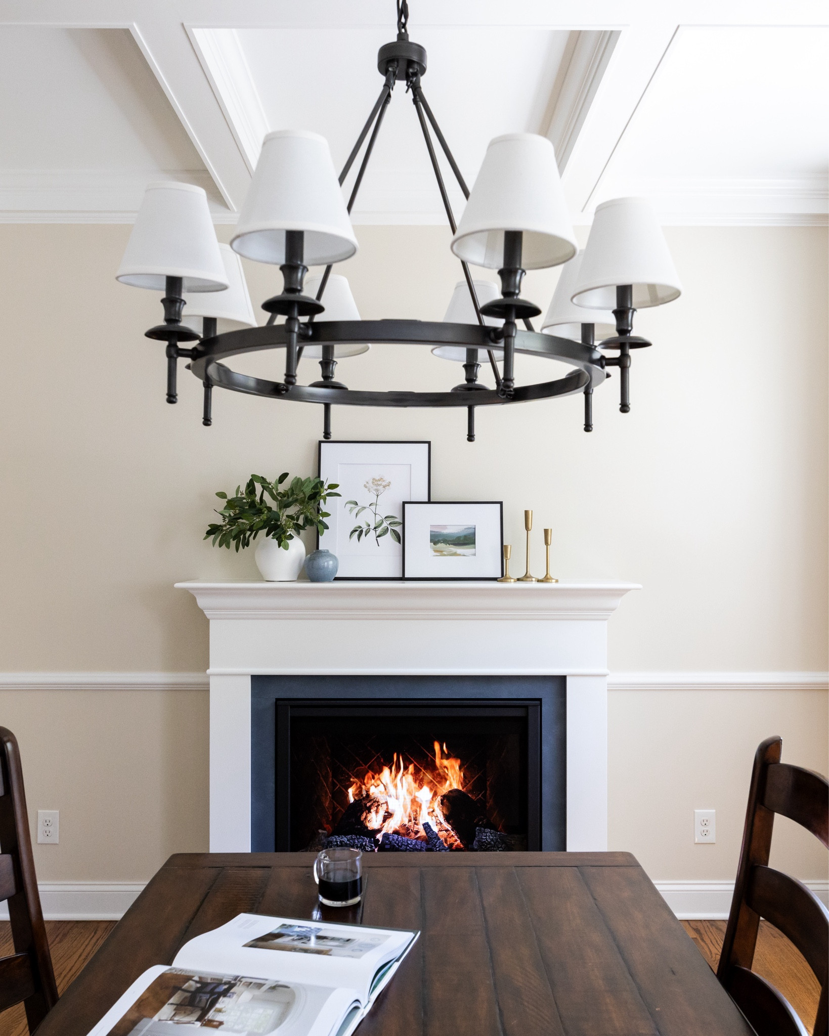 I partnered with Heat & Glo this past Spring to install this electric fireplace in our dining room, and we absolutely love it!   It looks so realistic and has multiple different background and sound options, and there are other decorative front options available too (this is the folio front).  I also installed their Wescott mantel kit here, after painting it white + creating a faux stone look on the pieces right around the fireplace.  We’ve been using the fireplace without heat this summer, but once the cold weather comes we’ll be able to turn on the heat for extra warmth too!  I kept the mantel decor relatively simple for this past spring/summer, but I can’t wait to refresh it for the fall and the holidays and host family in this space!  

#LTKHome